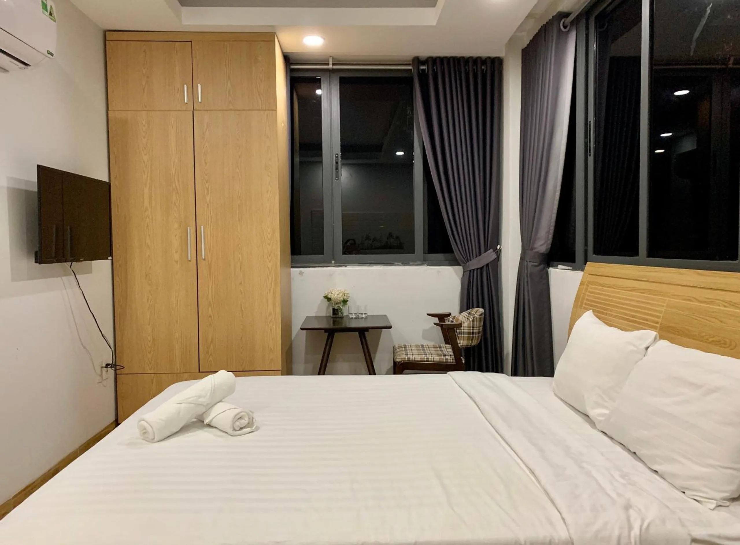 Photo of the whole room, Bed in The Lumiere near Tan Son Nhat Airport