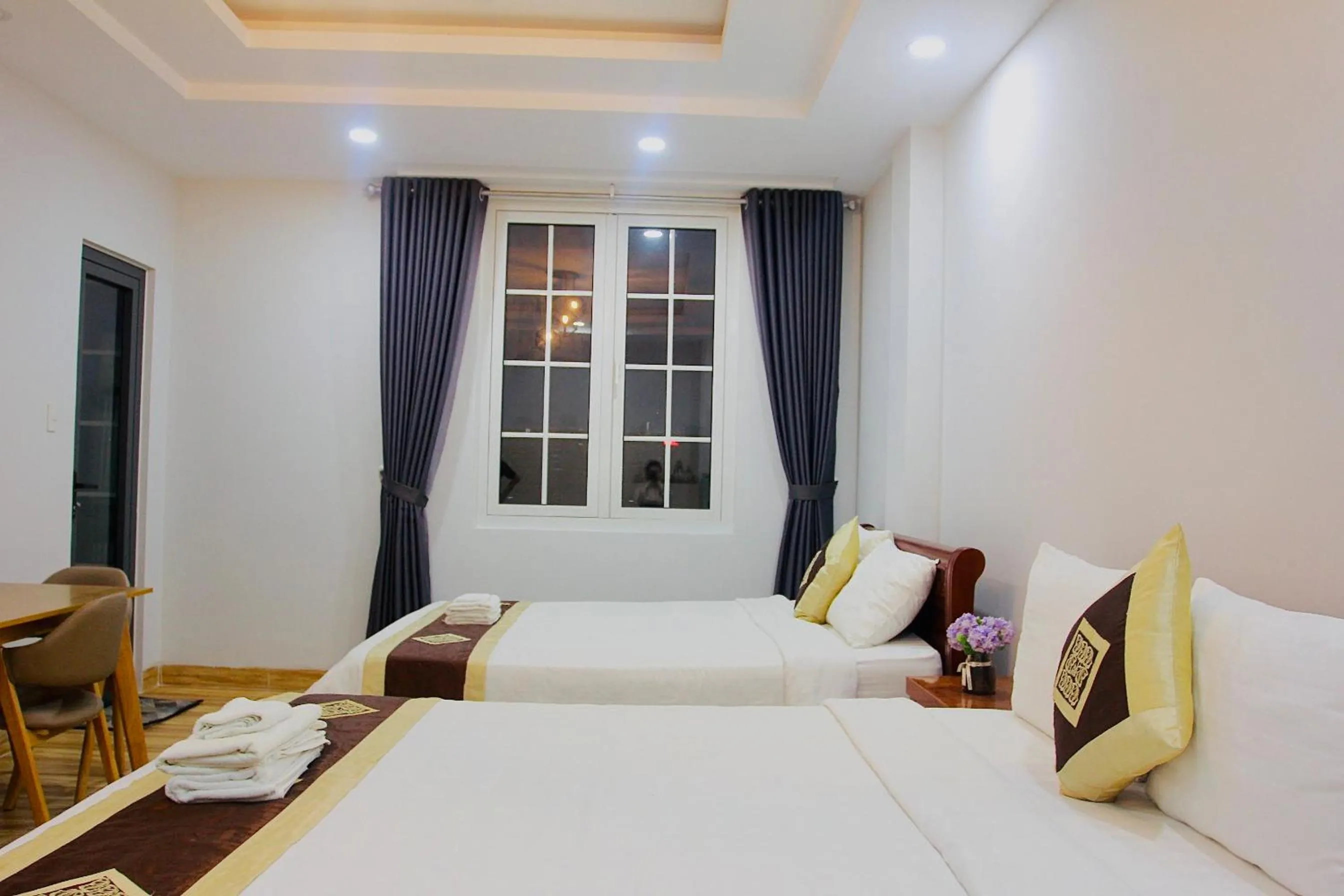 Photo of the whole room, Bed in The Lumiere near Tan Son Nhat Airport