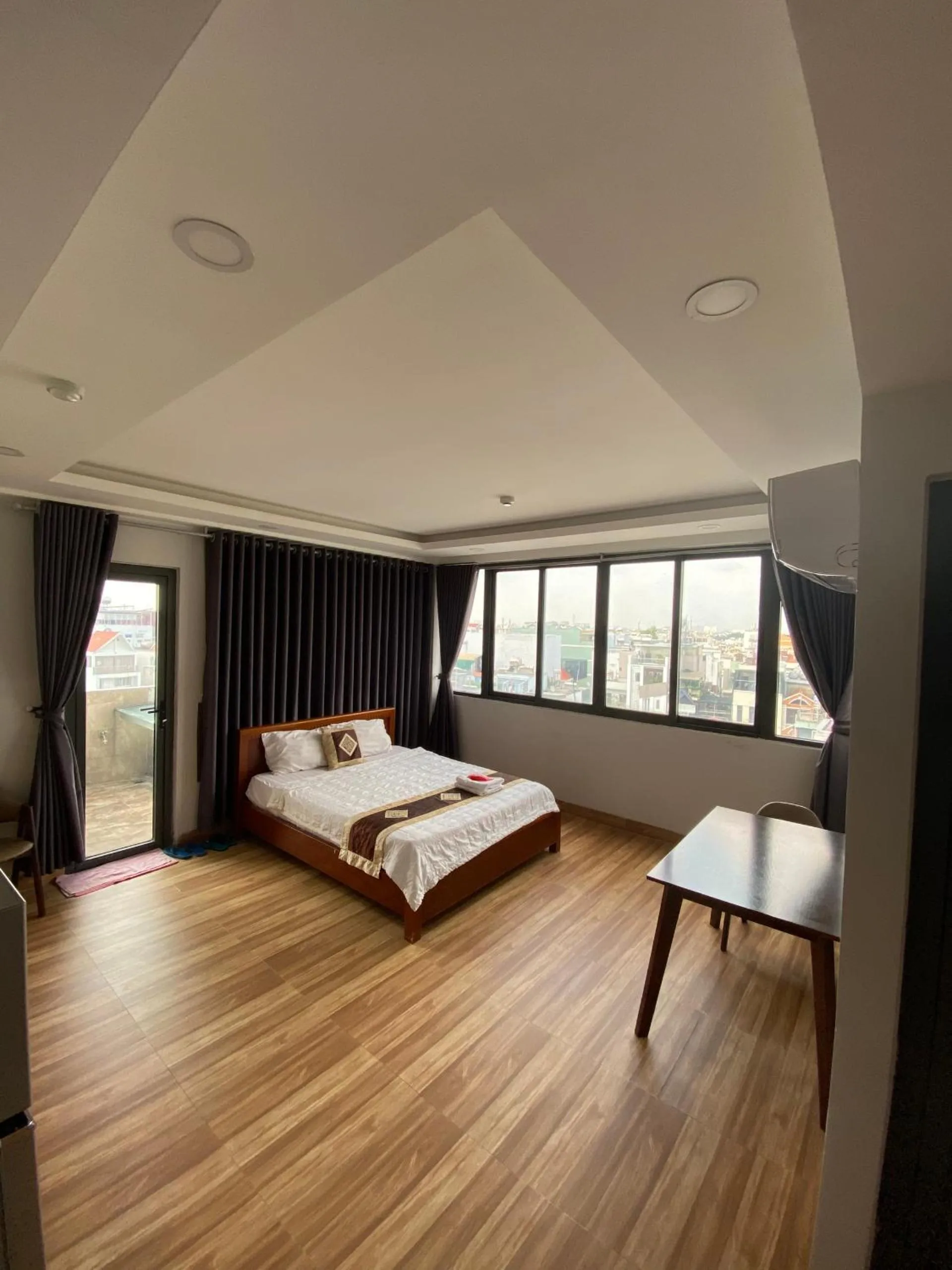 Photo of the whole room, Bed in The Lumiere near Tan Son Nhat Airport