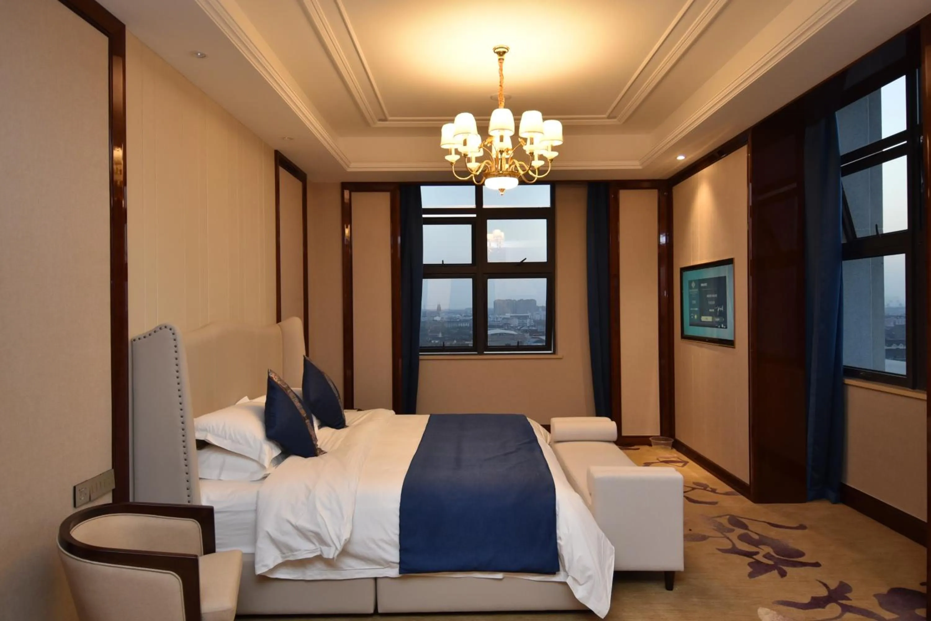 Photo of the whole room, Bed in Taizhou Haiyan Jinling International Hotel