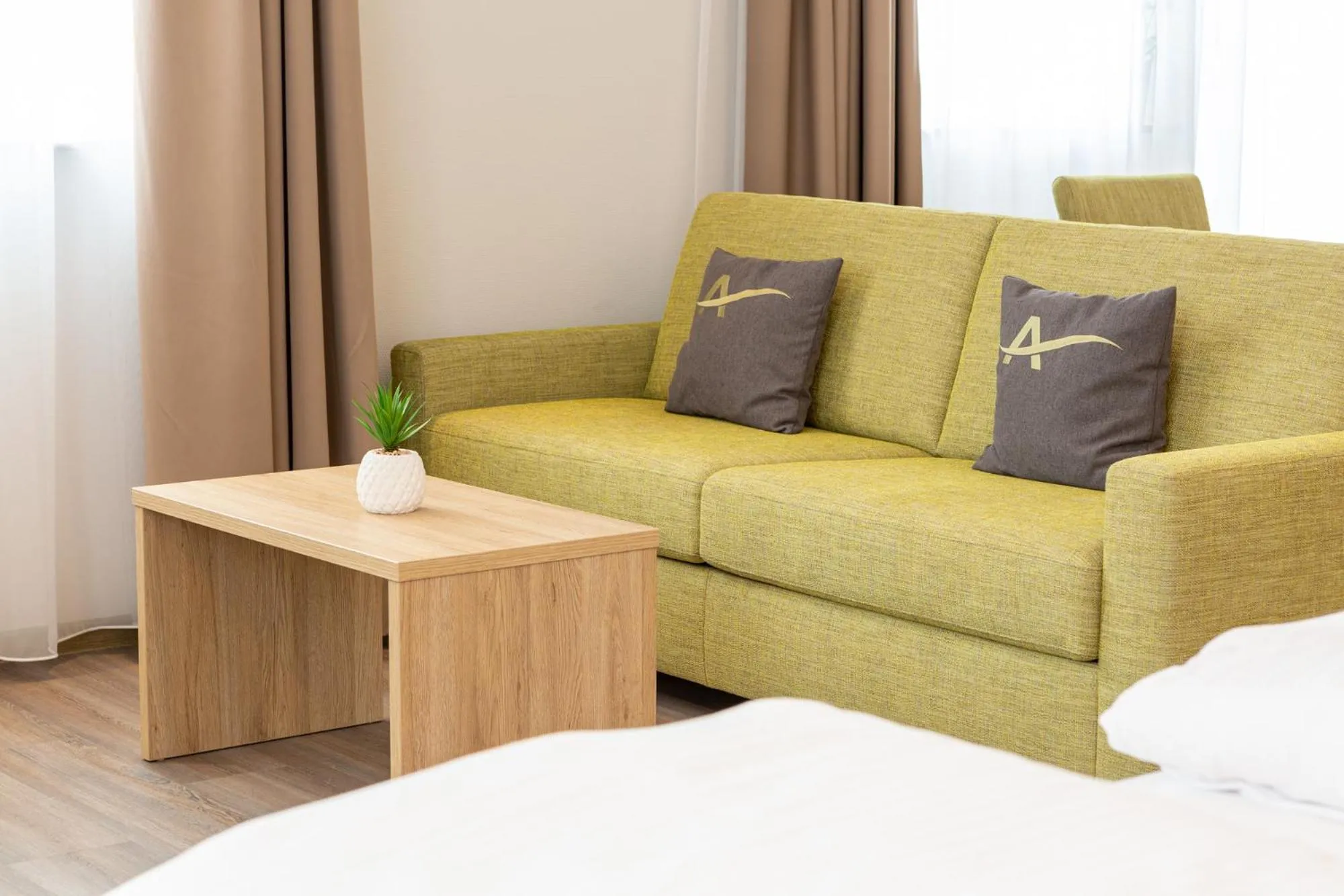 Bed in Aparthotel Am Pfaffenstein