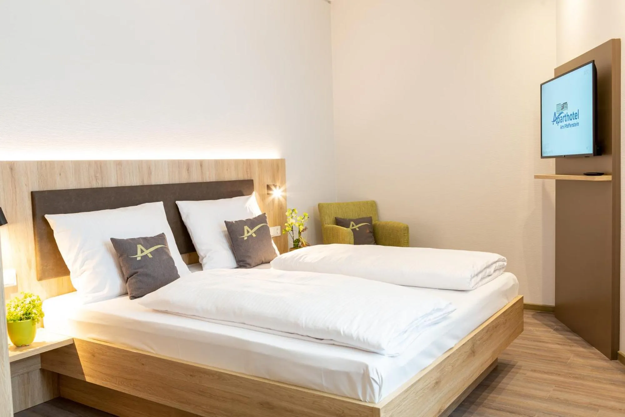 Bed in Aparthotel Am Pfaffenstein