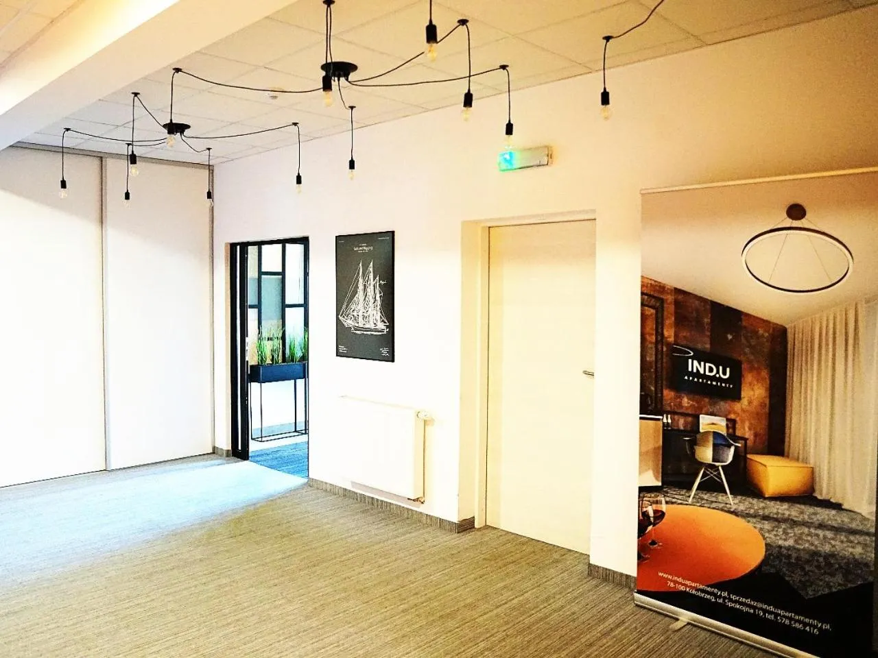 Property building in IND.U Apartamenty