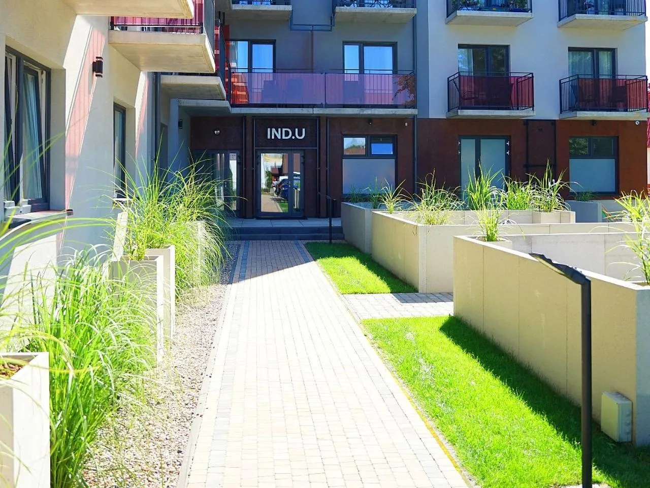 Property building in IND.U Apartamenty