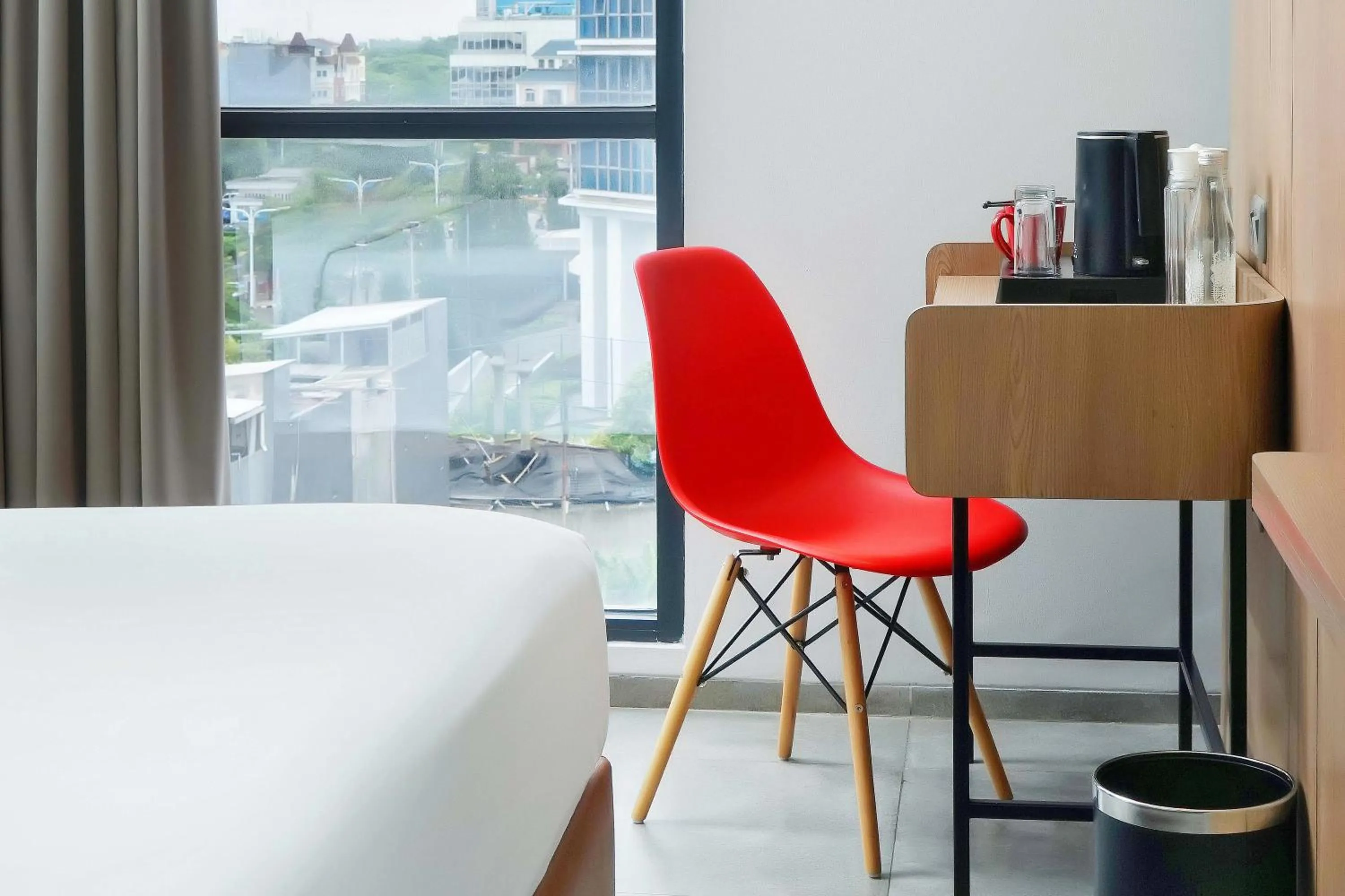 Bed in Neo Hotel Puri Indah