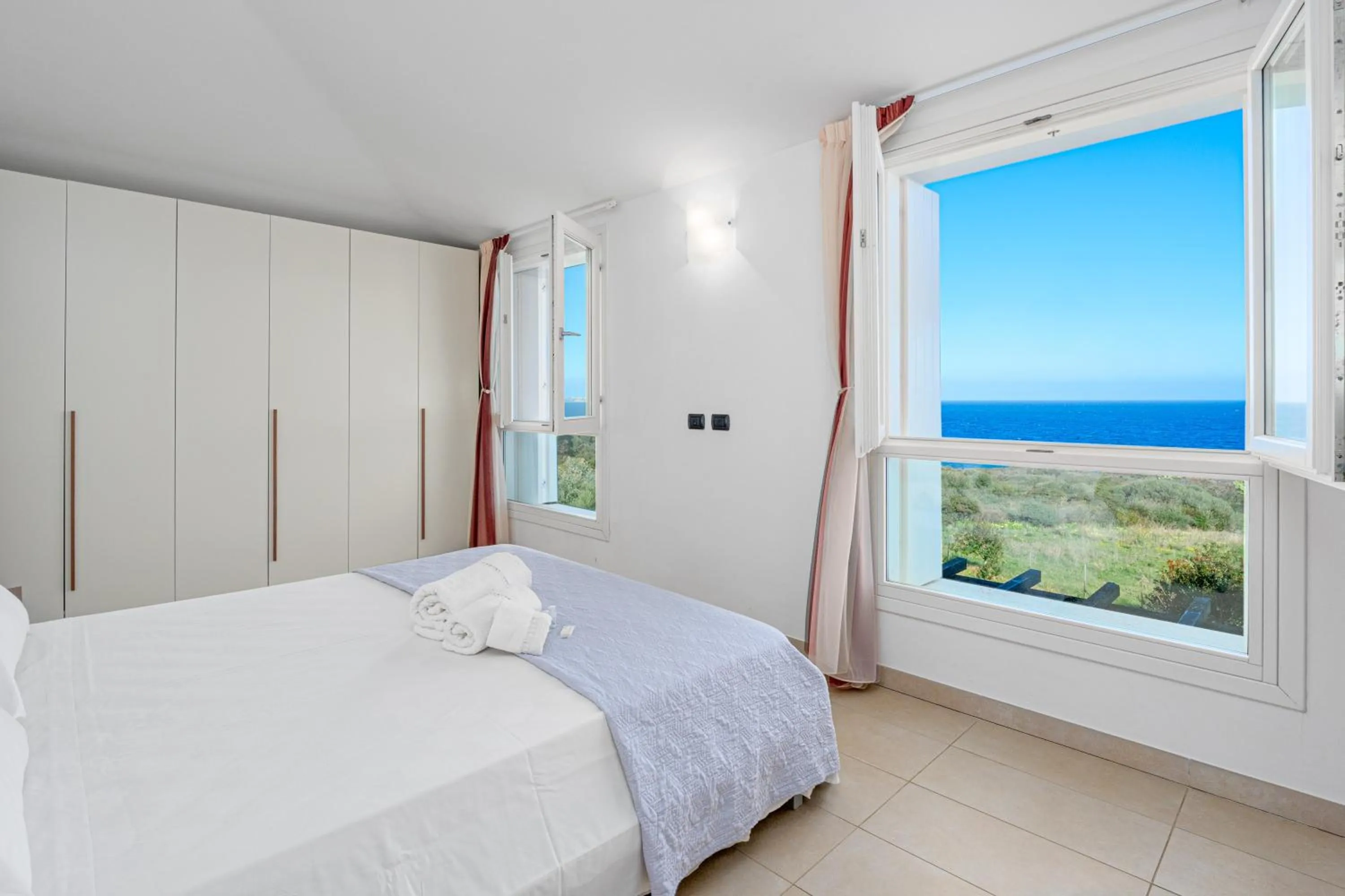 Living room, Bed in Villa Marconi Apartment 12a attico