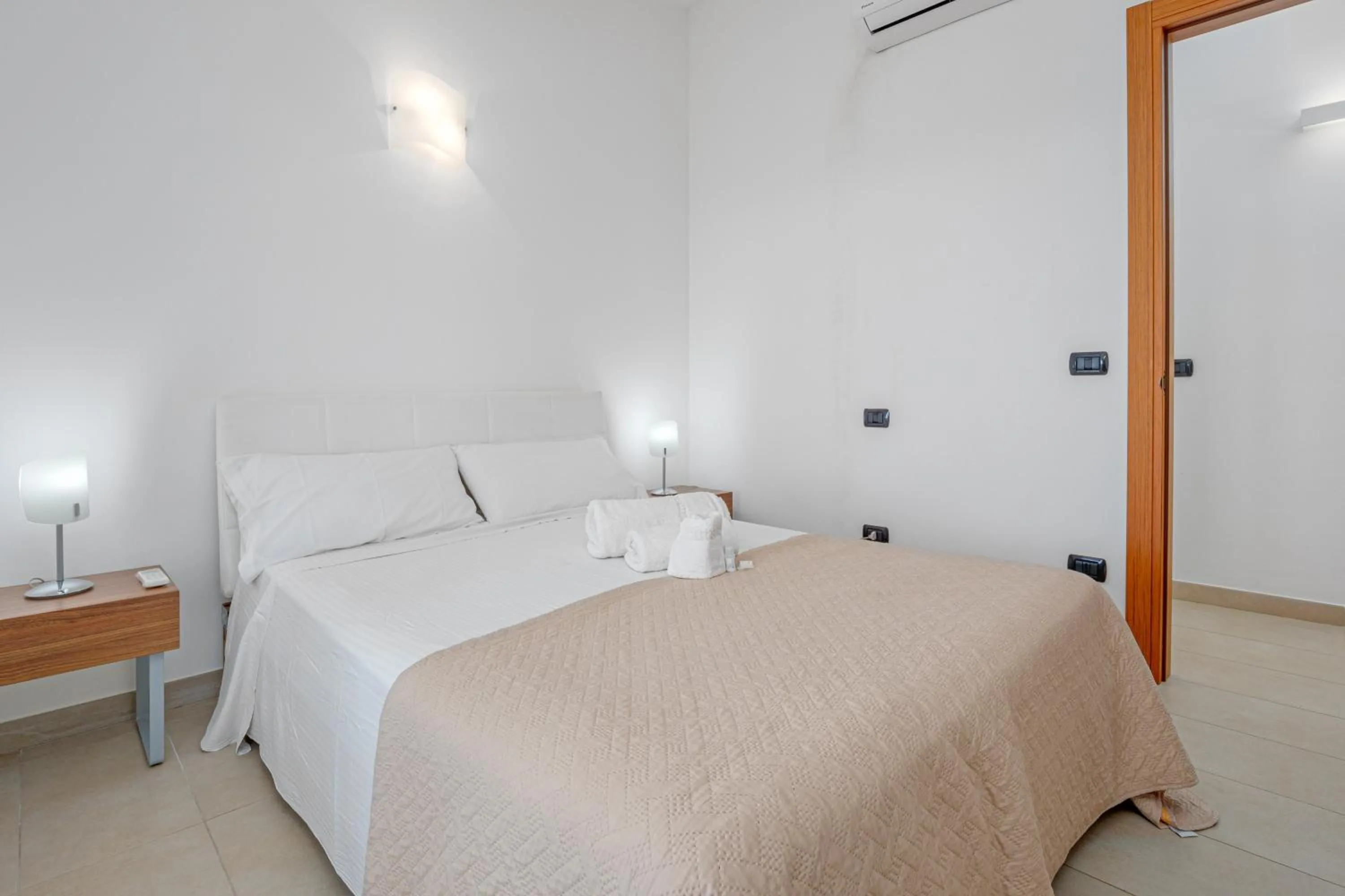 Living room, Bed in Villa Marconi Apartment 12a attico