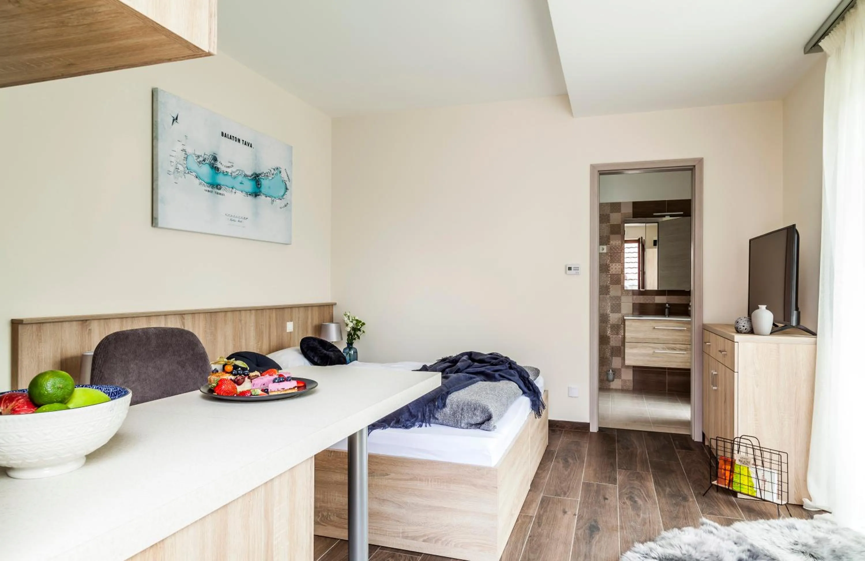 Seating area, Bed in Pilger Apartments