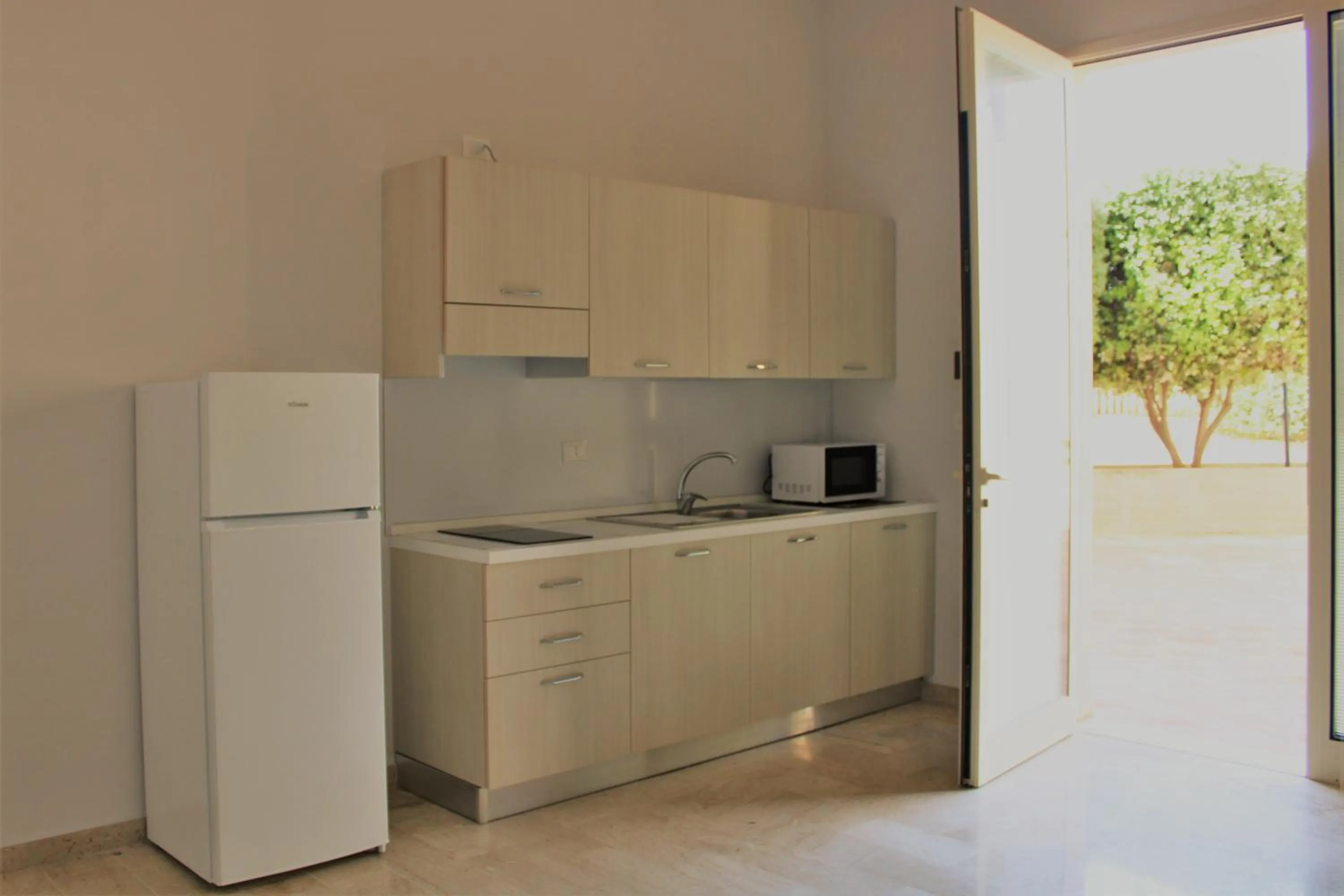 Kitchen or kitchenette in Zibibbo Beach Apartments - Trapani