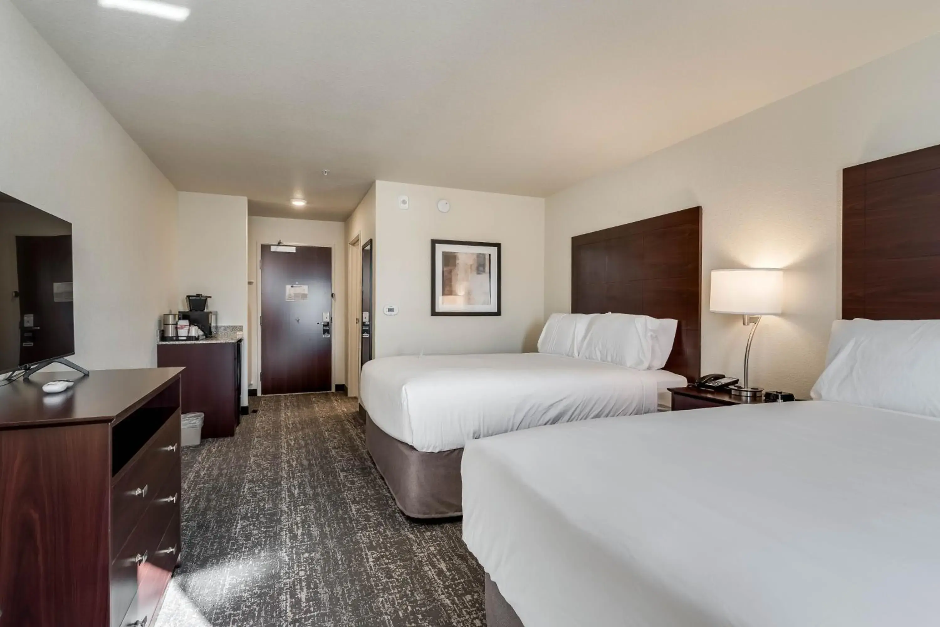 Bed in Cobblestone Hotel & Suites - Morgan Bed in Cobblestone Hotel & Suites - Morgan