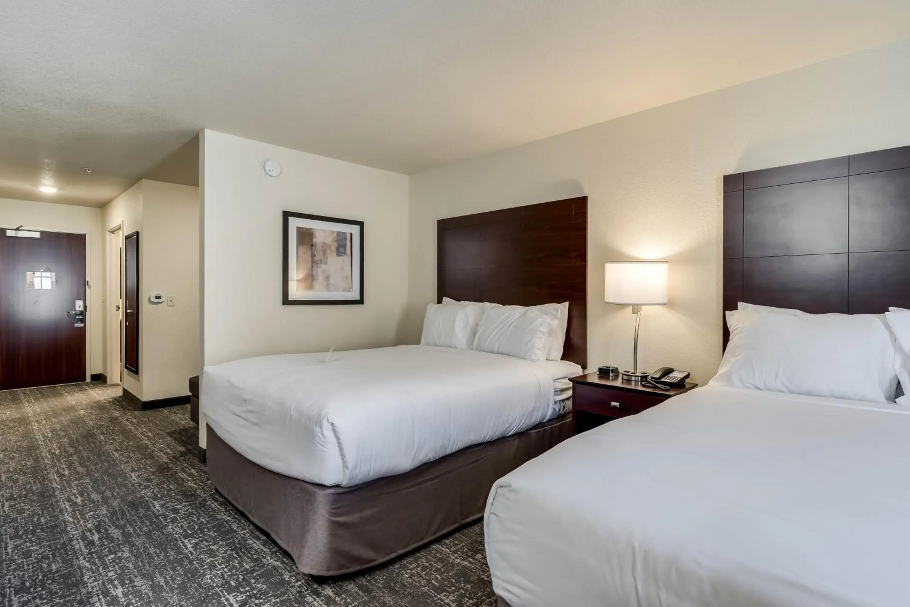 Bed in Cobblestone Hotel & Suites - Morgan Bed in Cobblestone Hotel & Suites - Morgan