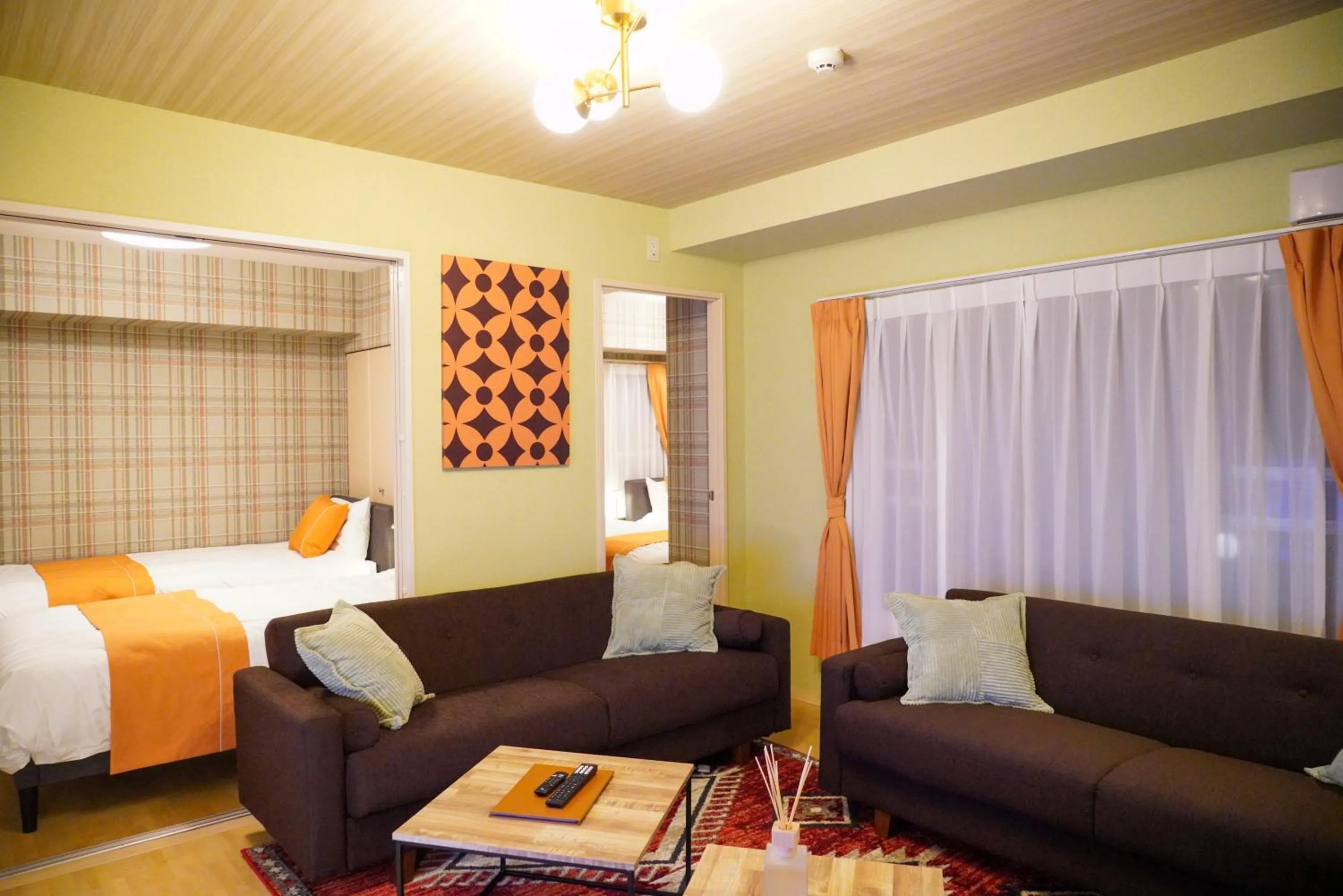 Living room, Bed in SAPPORO HILLS