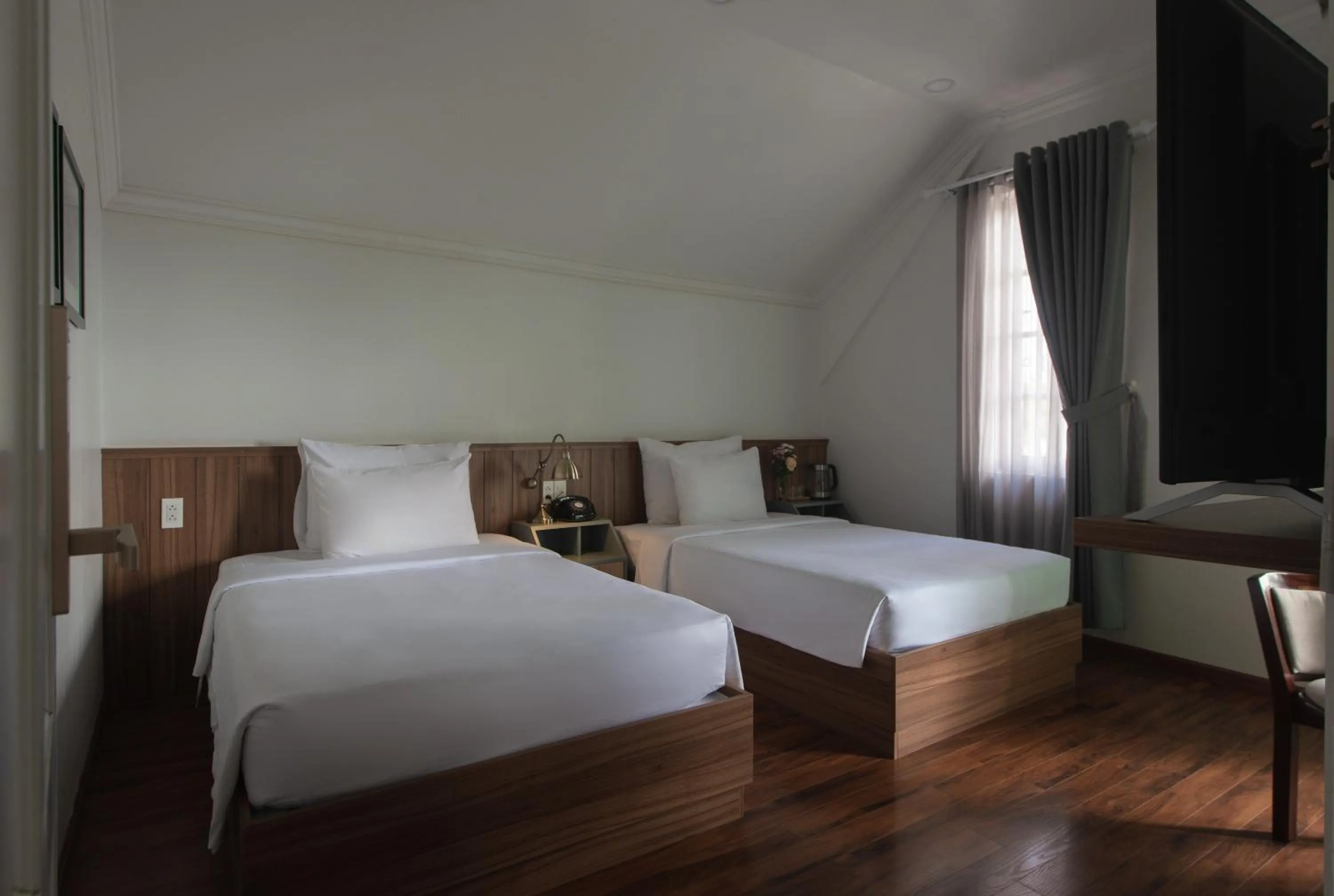 Bed in Le Soleil Boutique Hotel