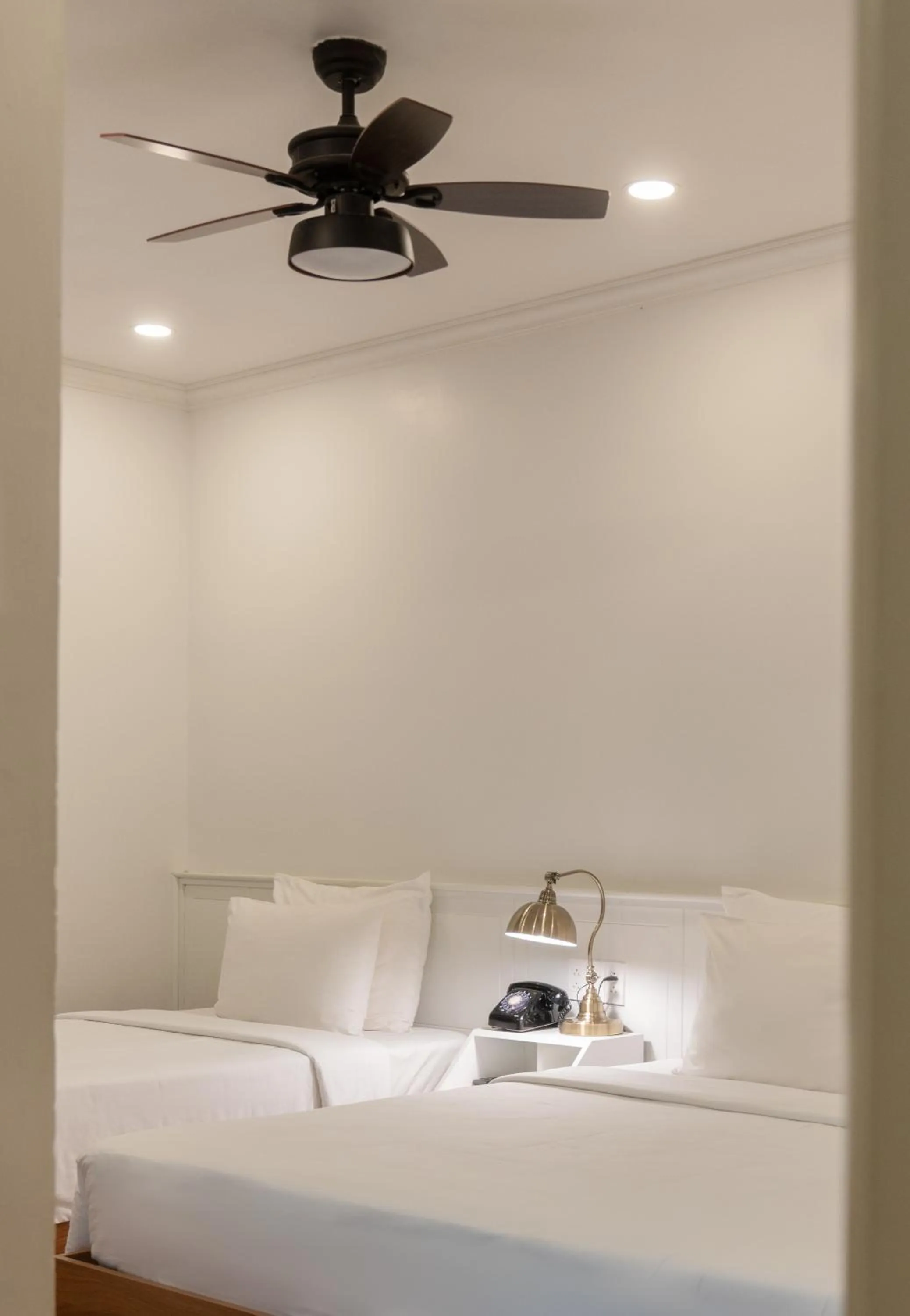 Bed in Le Soleil Boutique Hotel