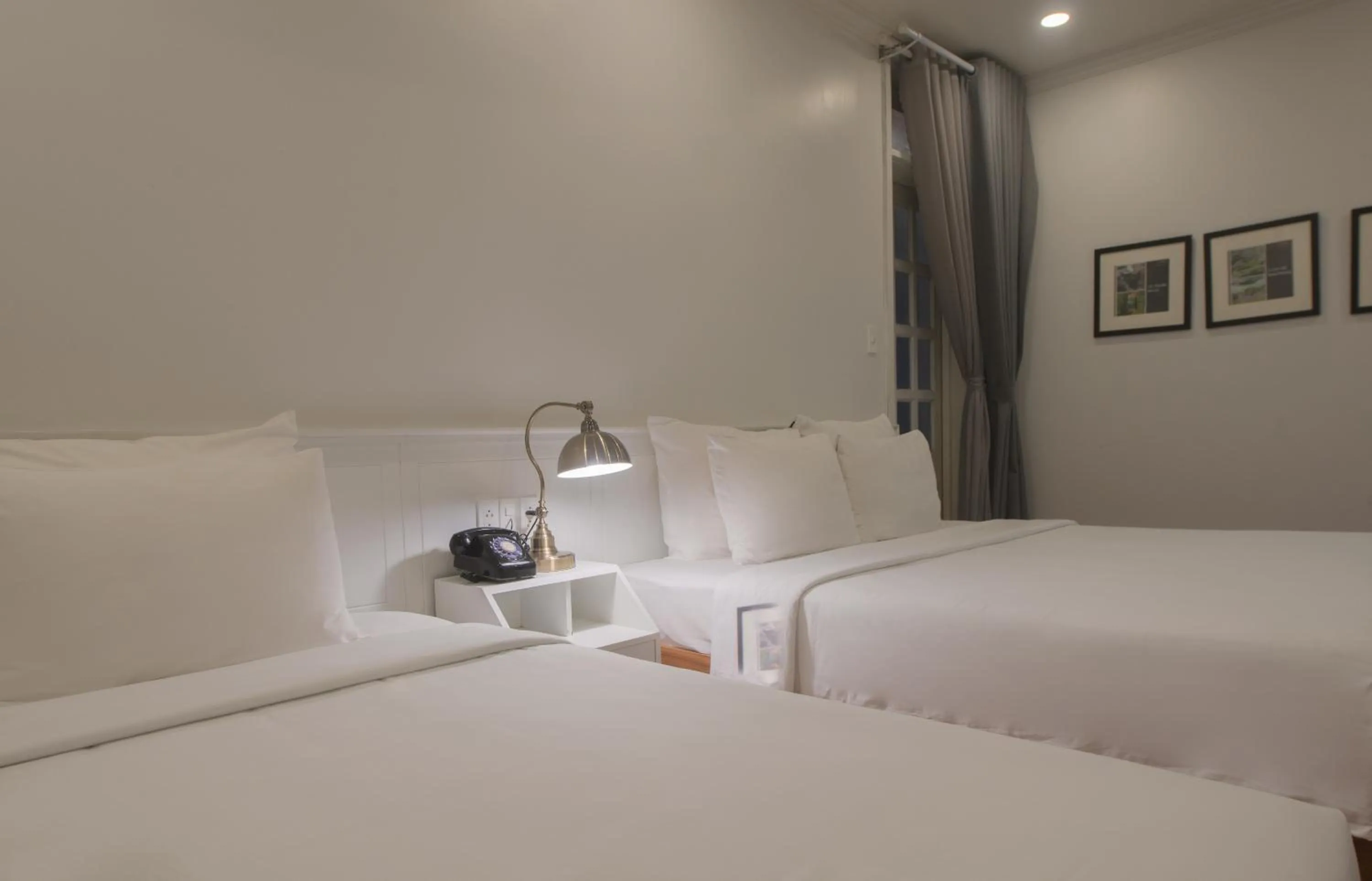 Bed in Le Soleil Boutique Hotel