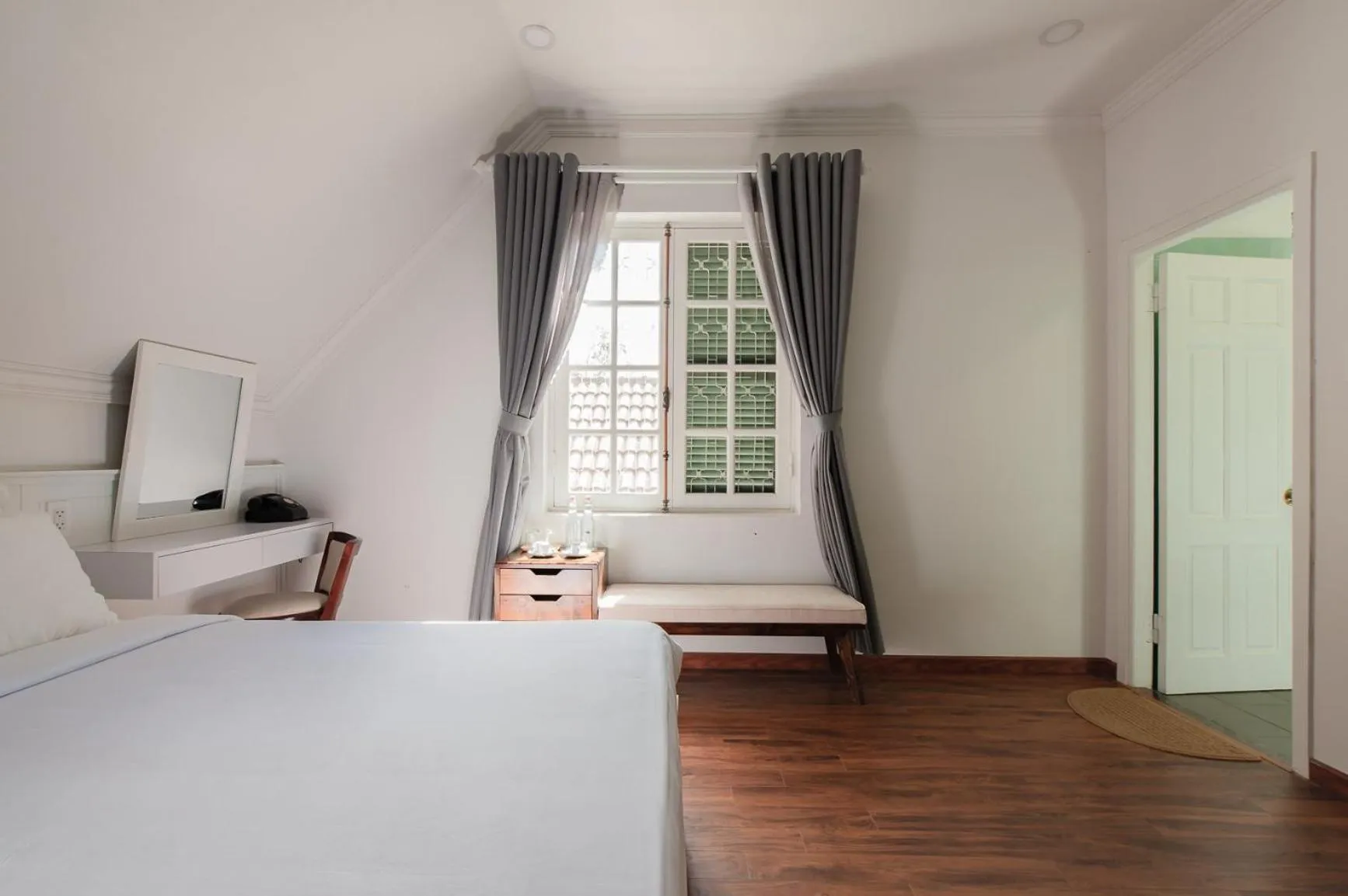 Bed in Le Soleil Boutique Hotel