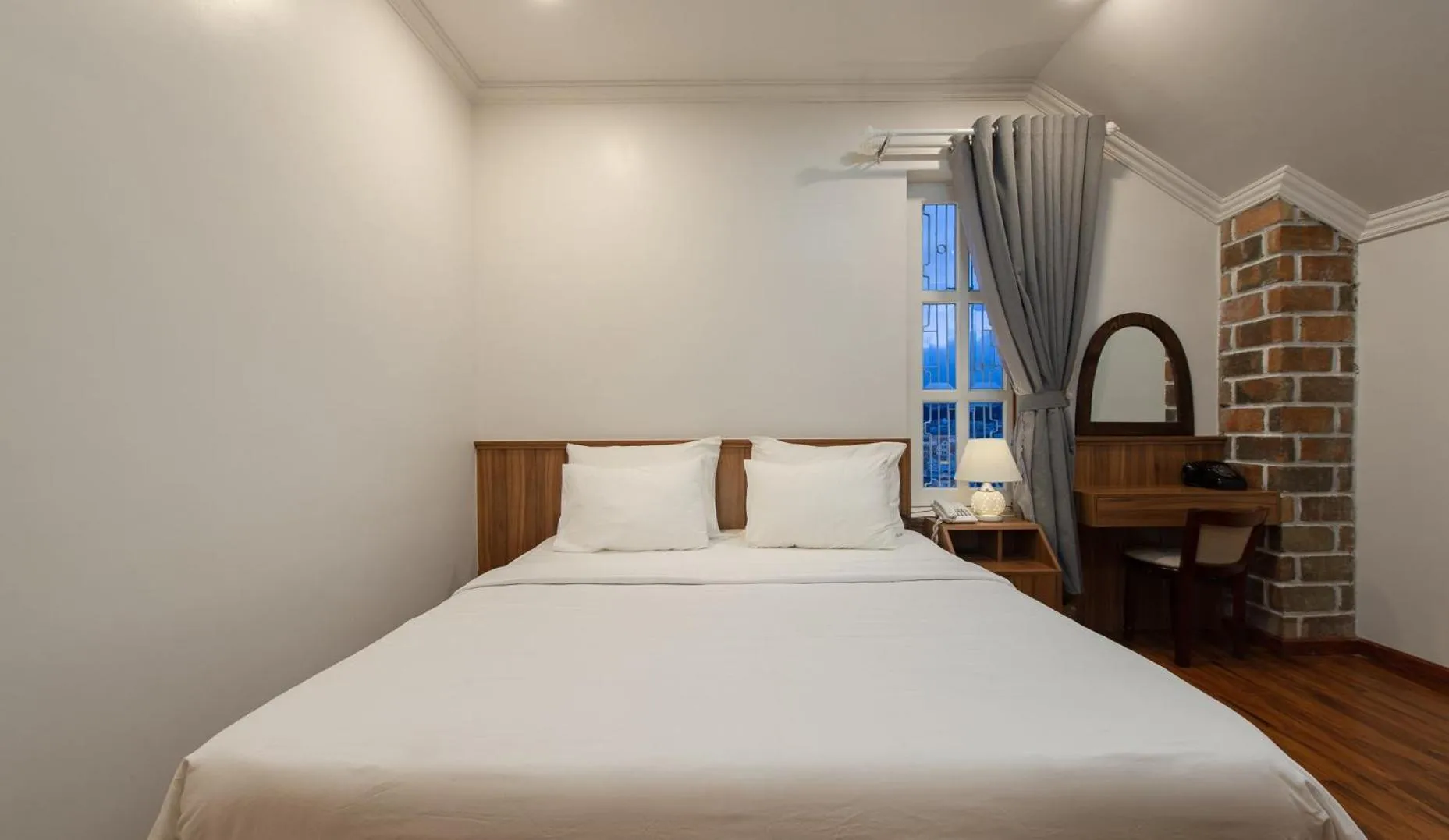 Bed in Le Soleil Boutique Hotel