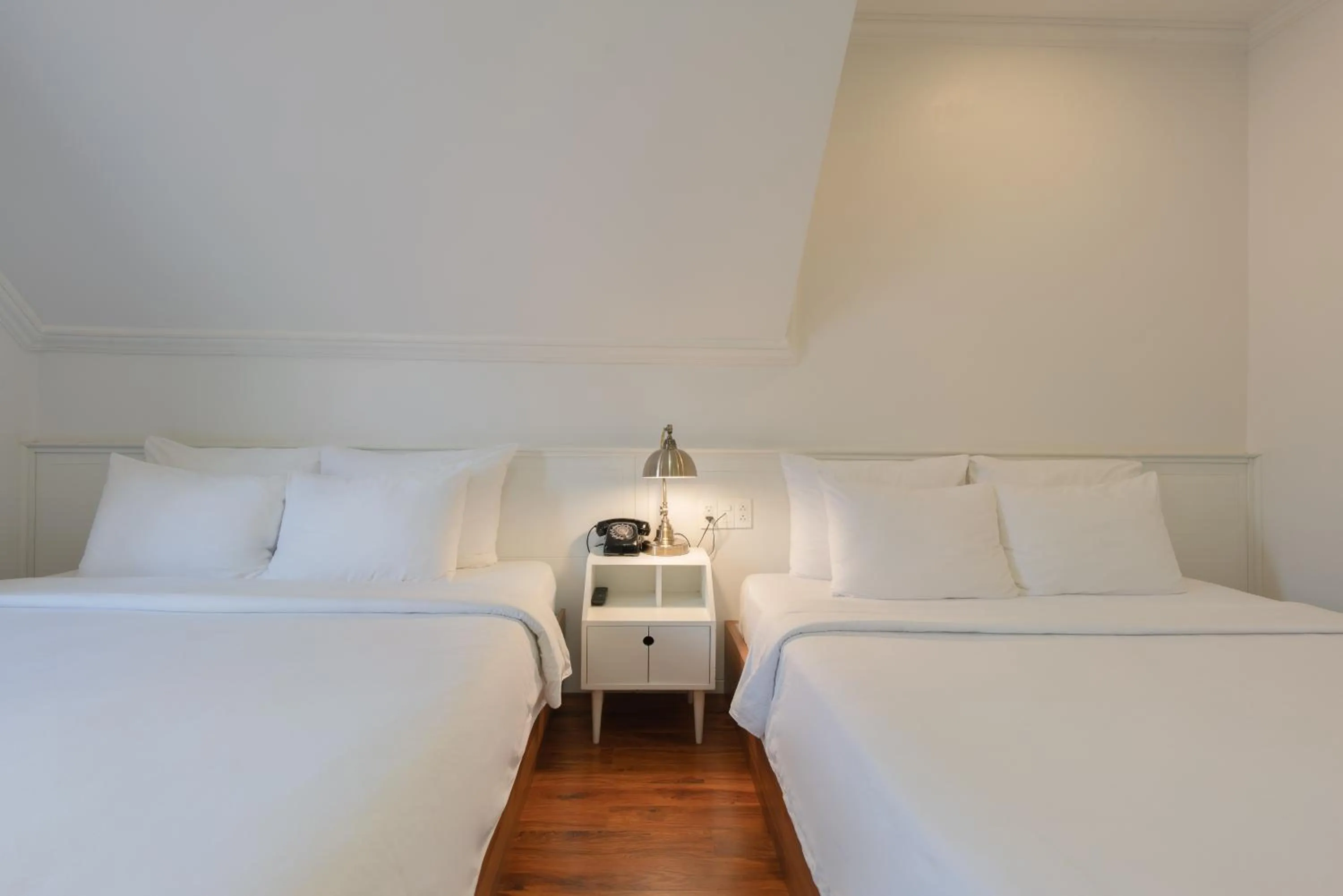 Bed in Le Soleil Boutique Hotel