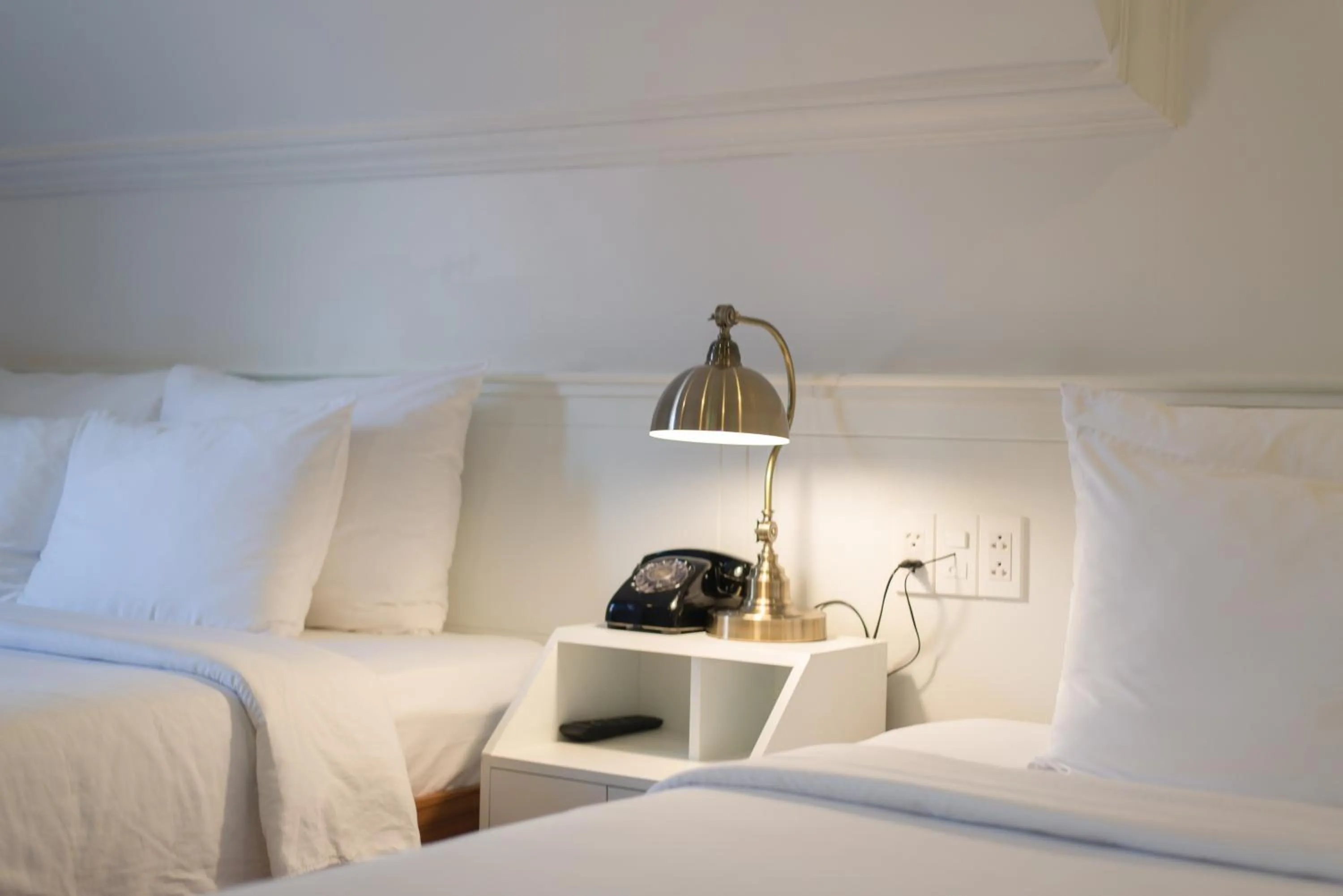 Bed in Le Soleil Boutique Hotel