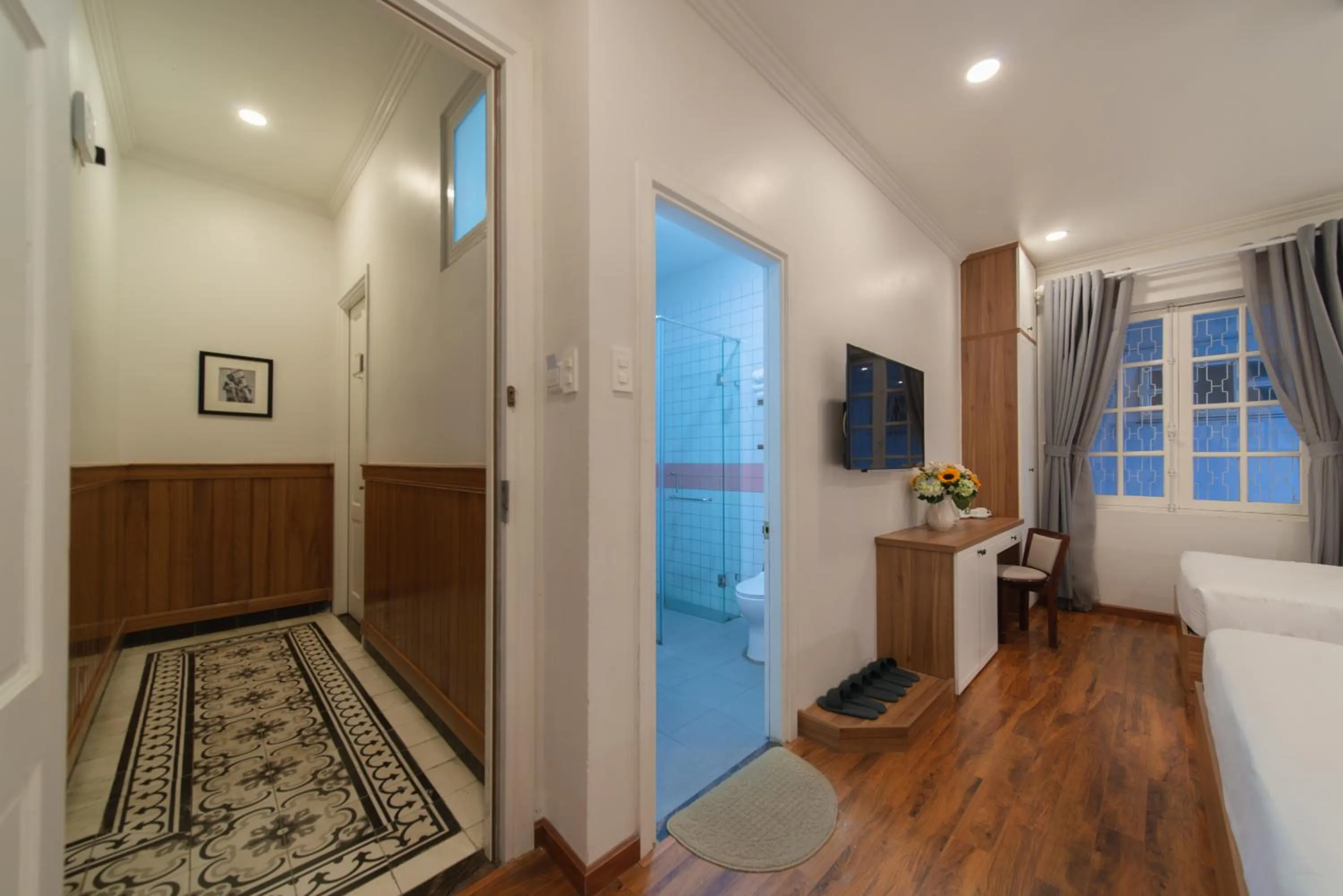 Bed in Le Soleil Boutique Hotel