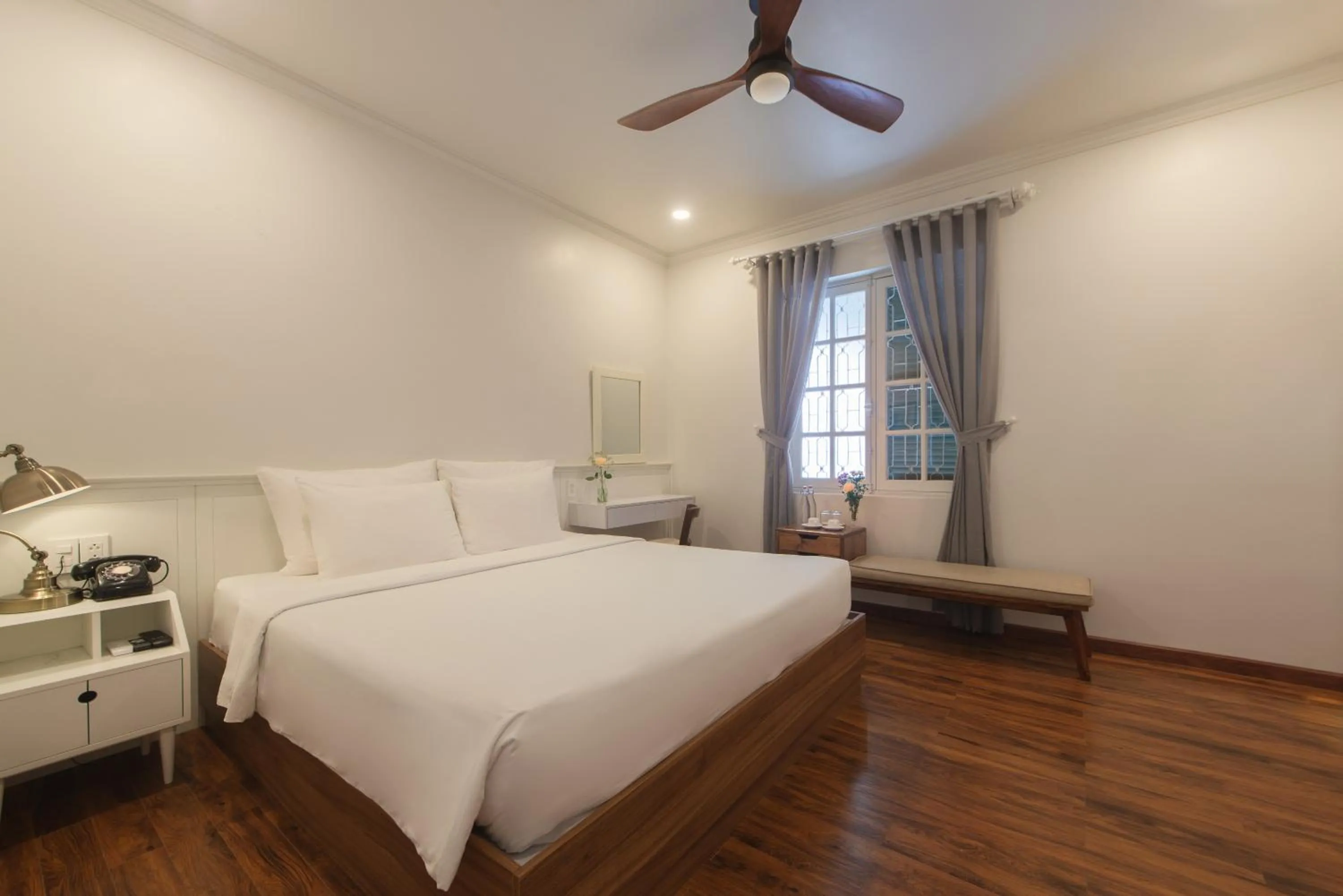 Bed in Le Soleil Boutique Hotel