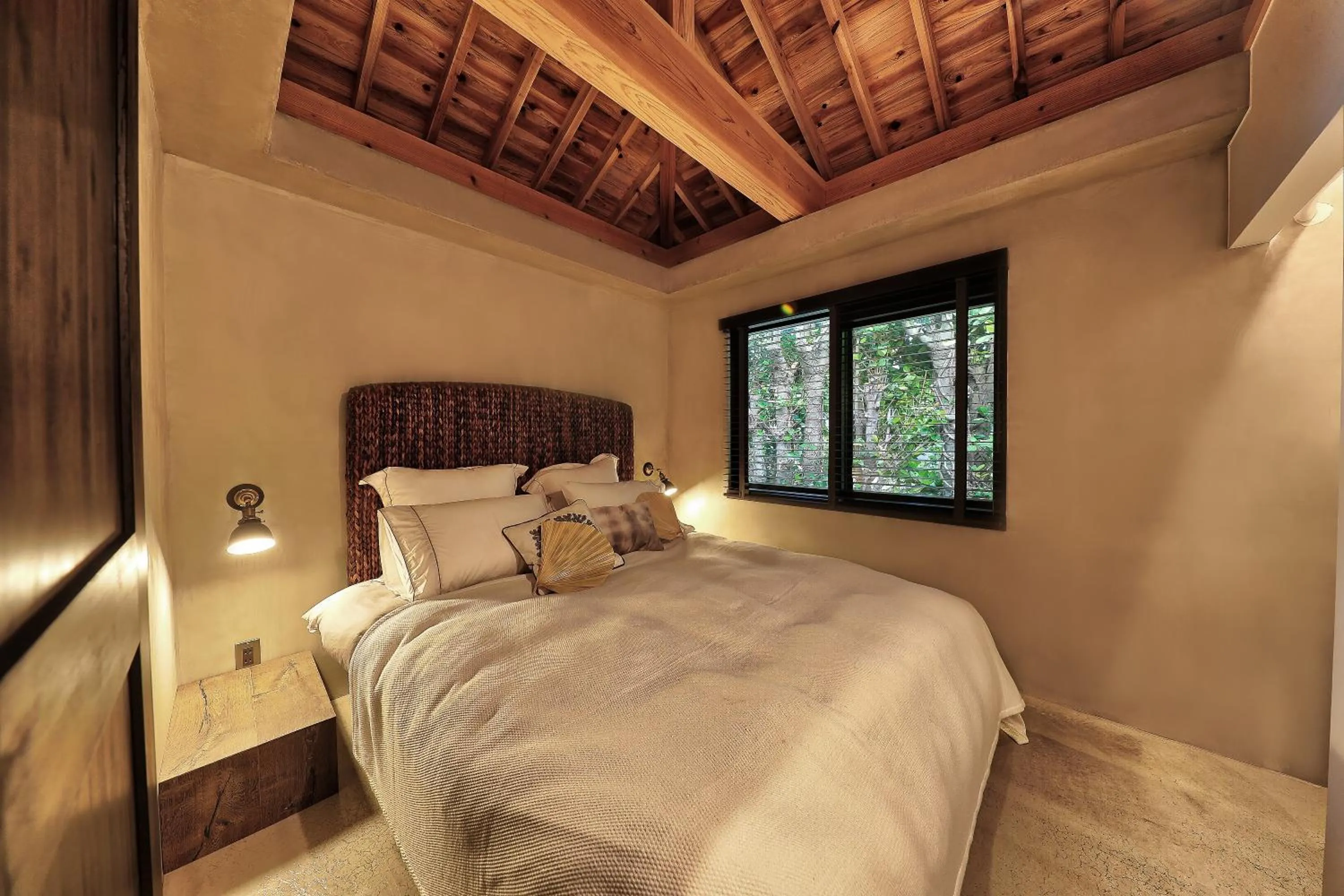 Bed in ADAN RESORT HANALI village sesokojima