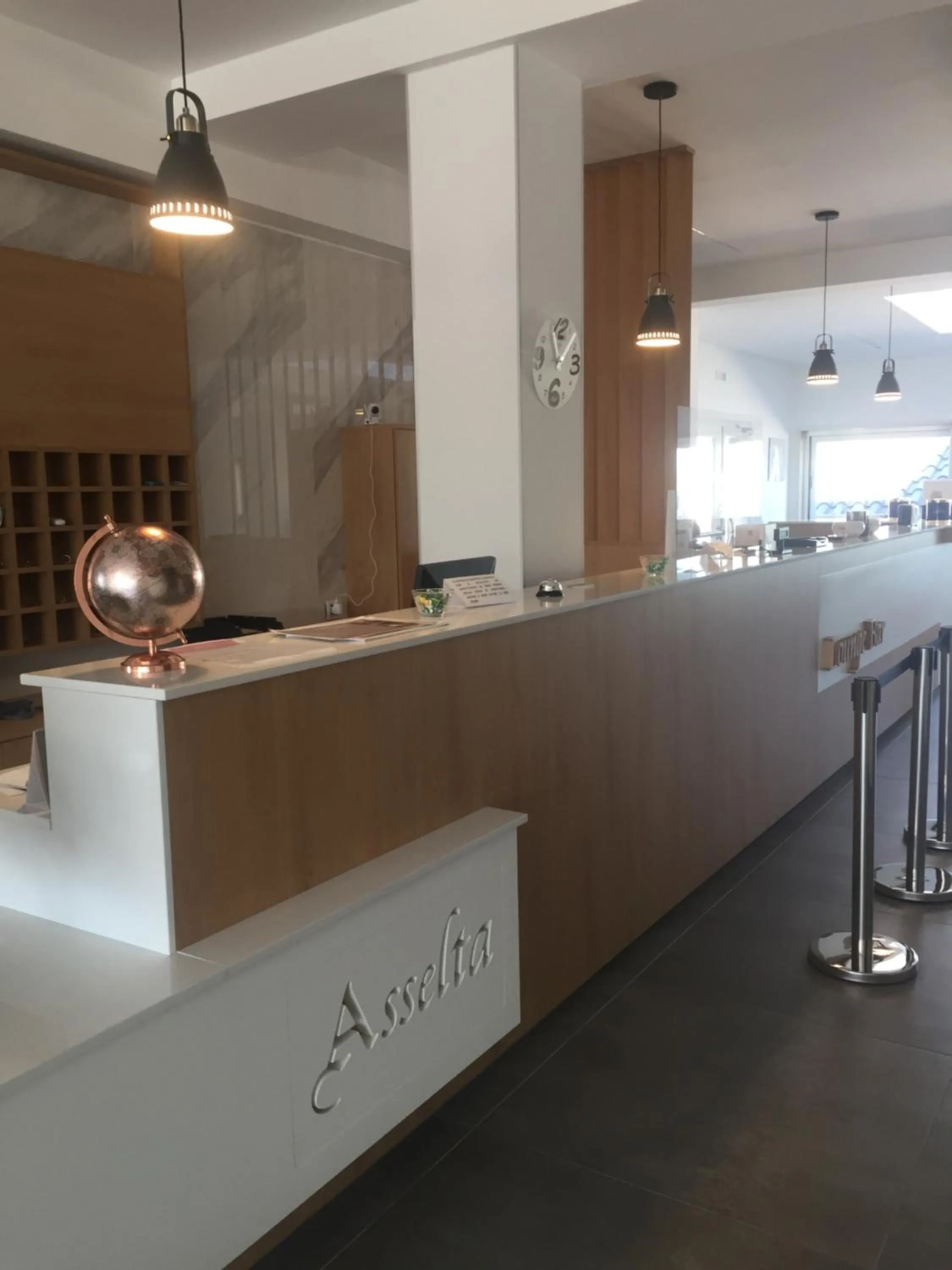 Lobby or reception in Asselta Hotel