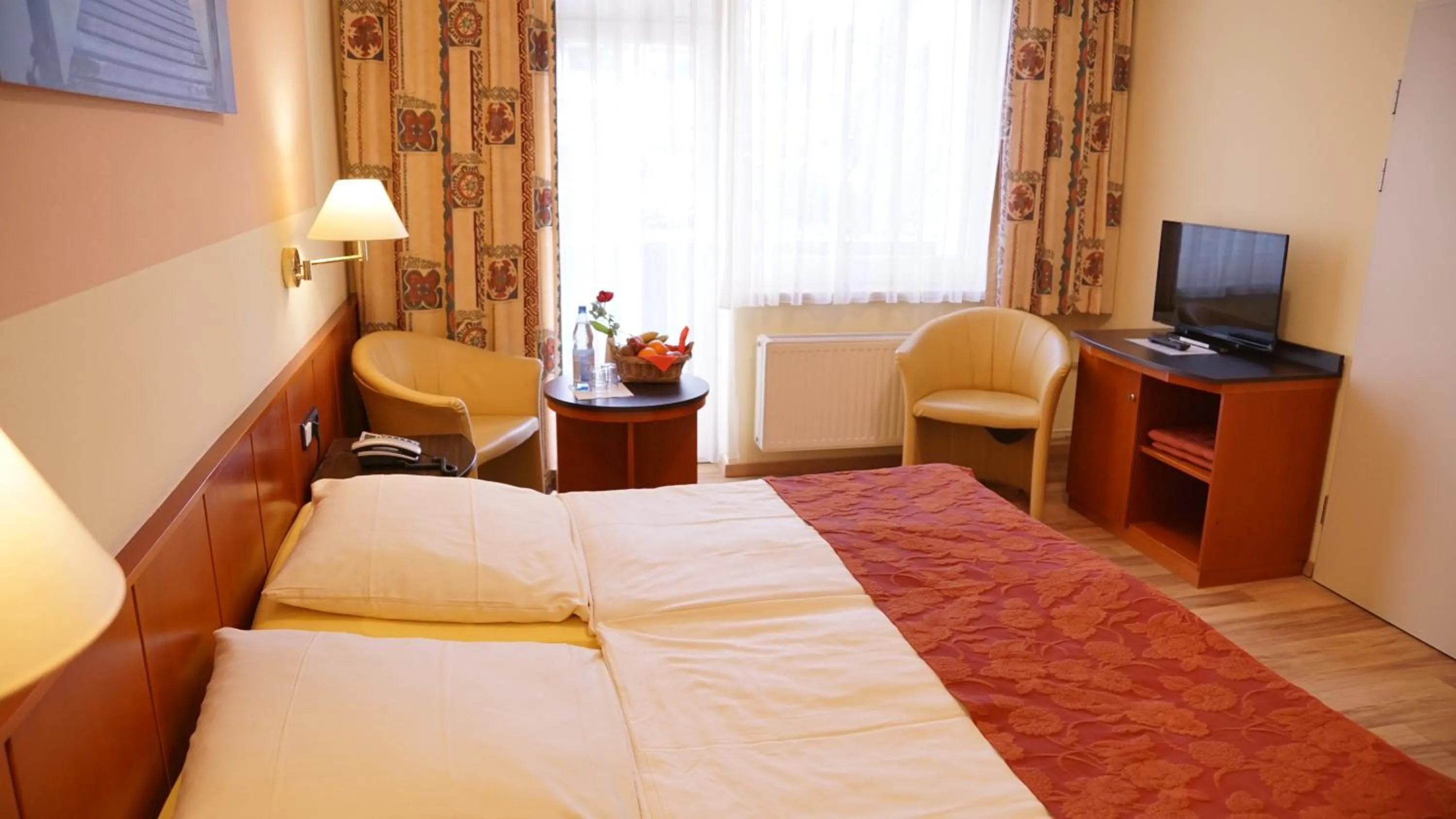 Bed in Aura Hotel