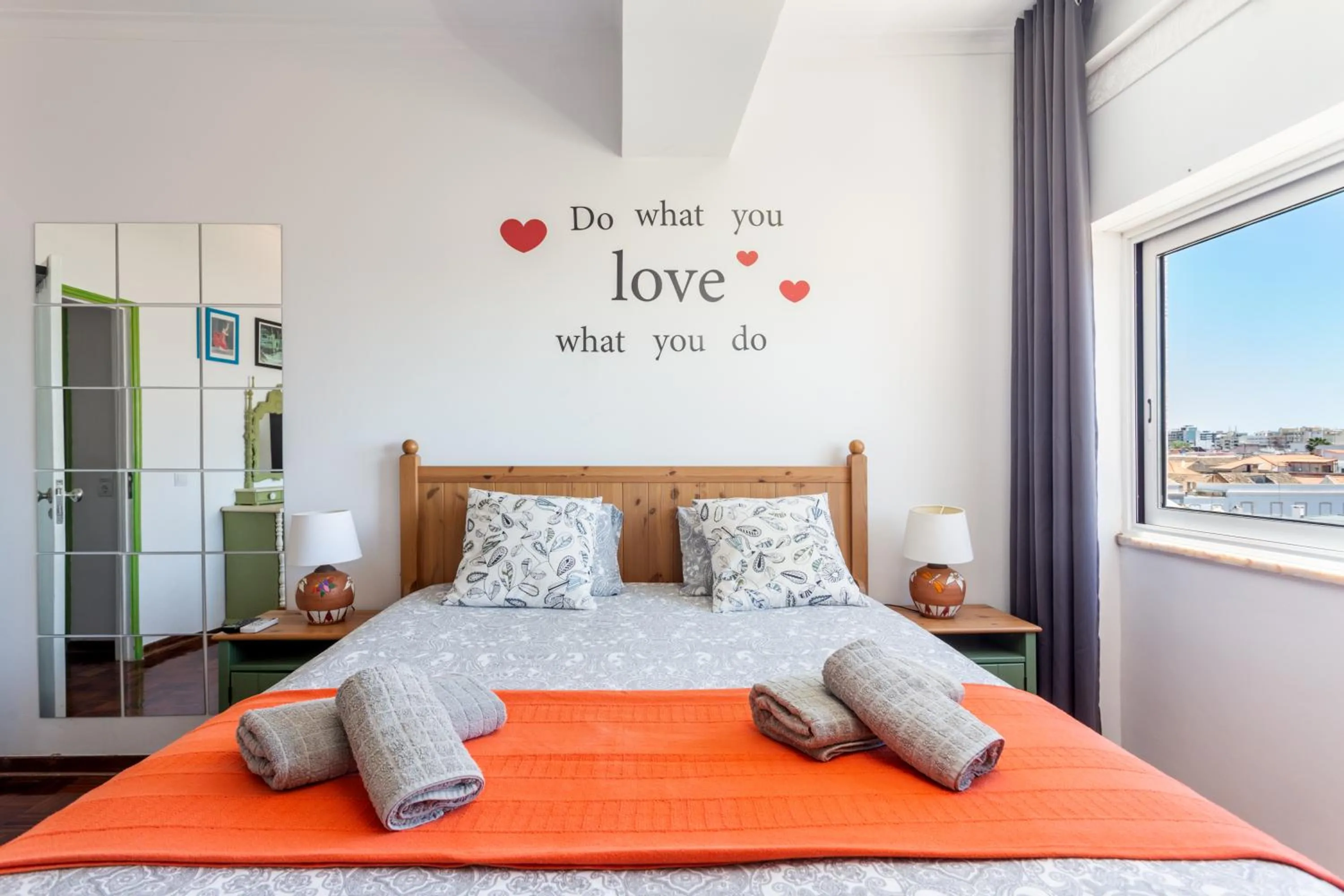Bed in Dreamers Duplex with Seaview
