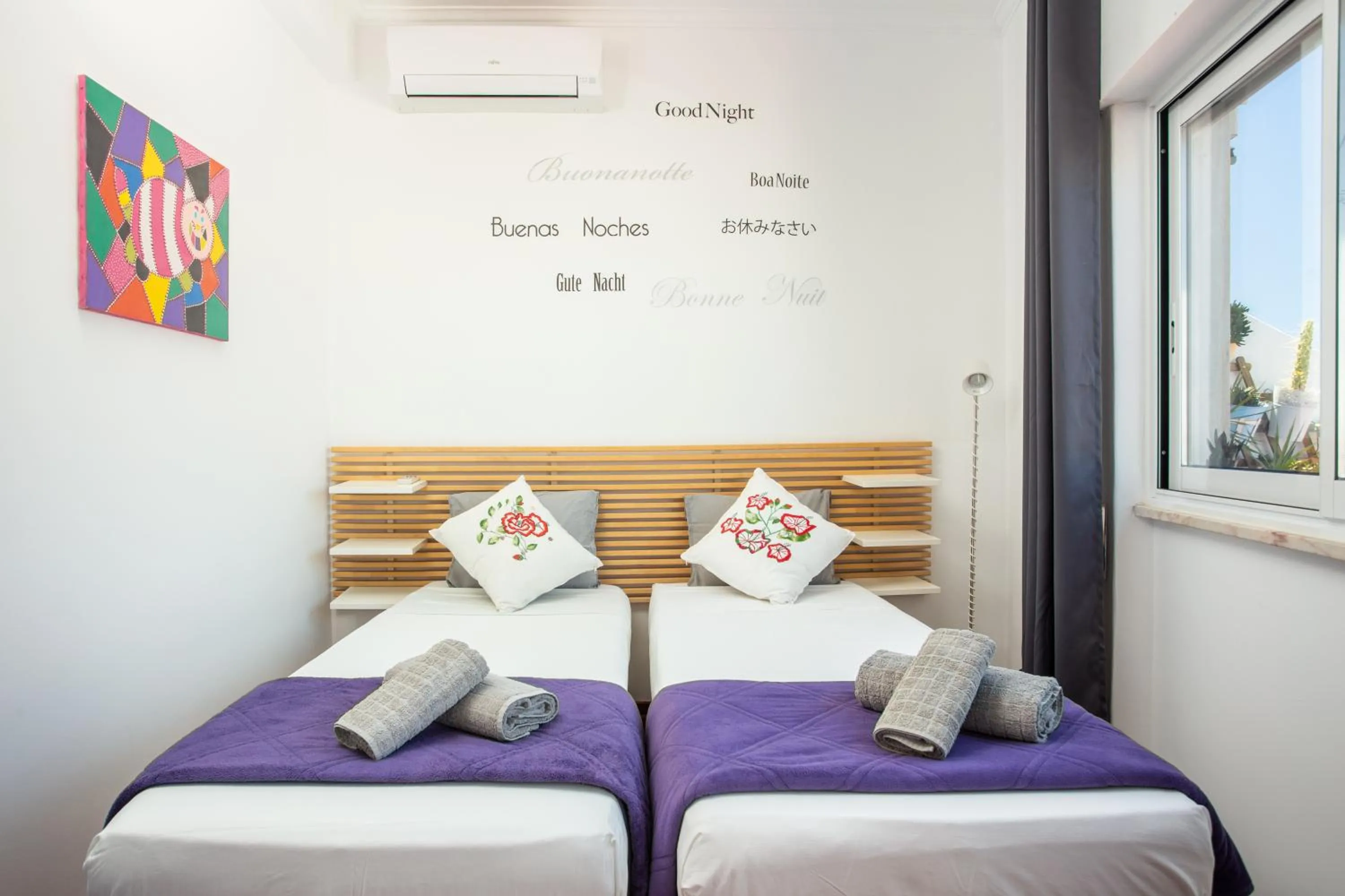 Bed in Dreamers Duplex with Seaview