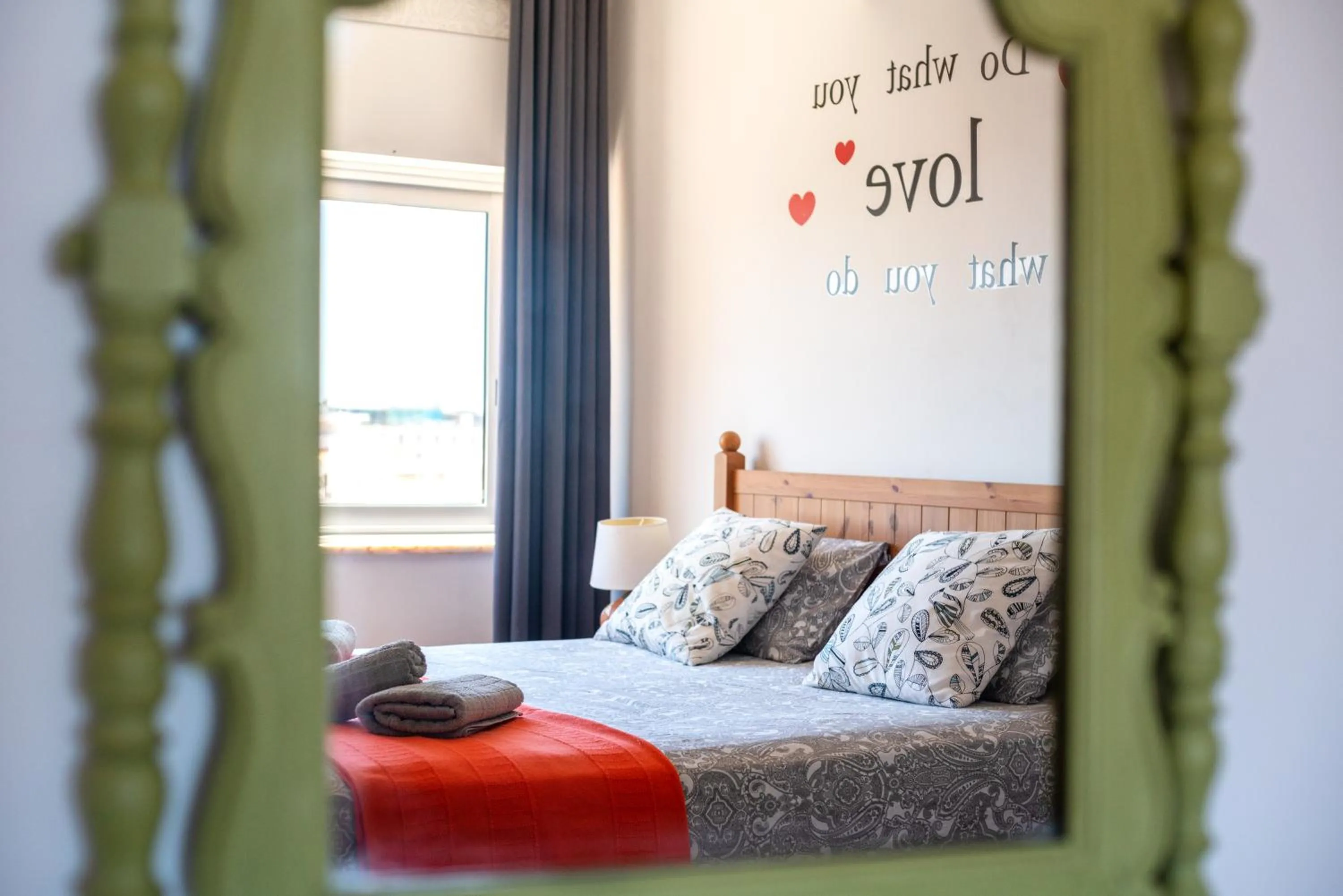 Decorative detail, Bed in Dreamers Duplex with Seaview