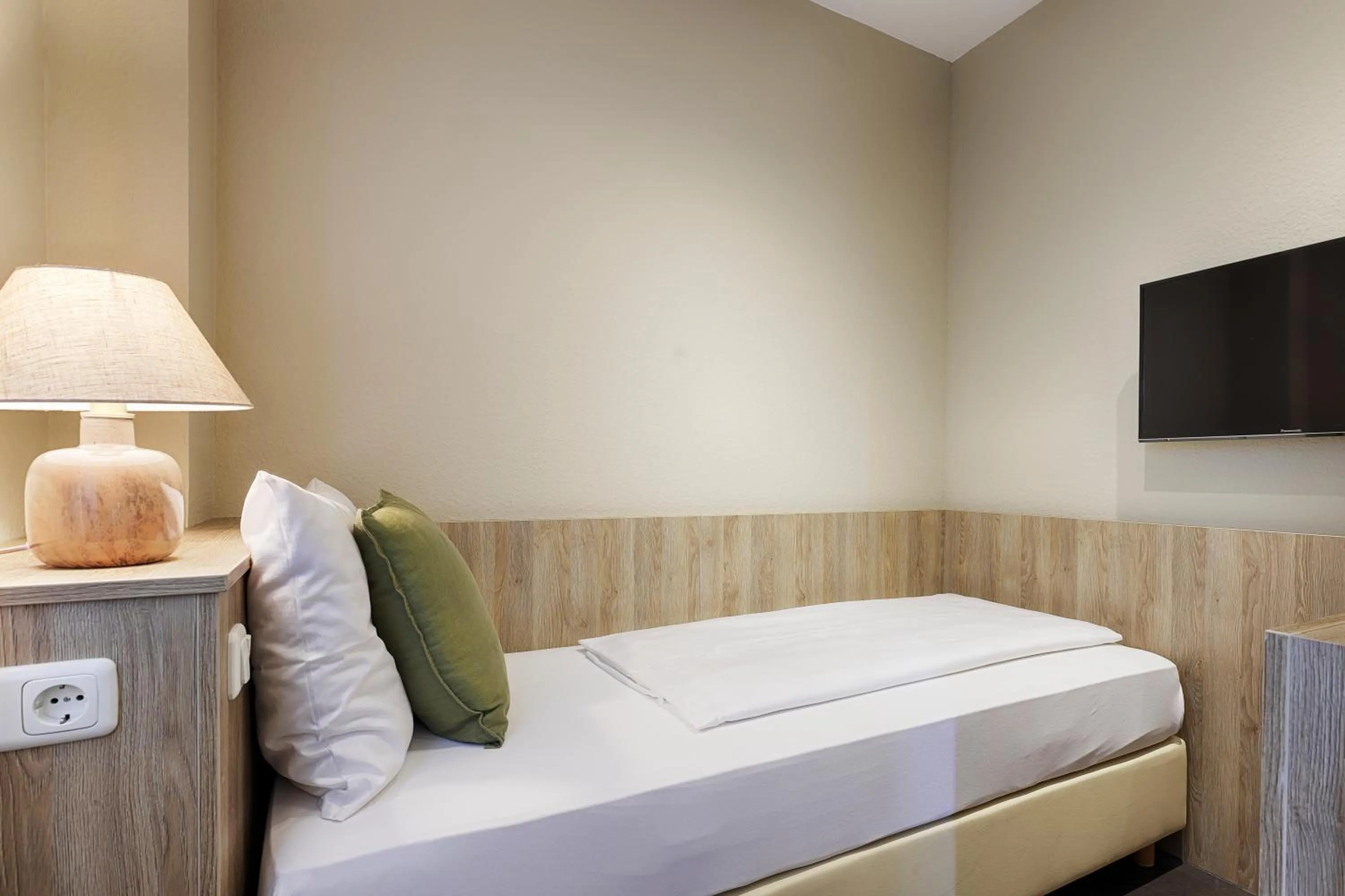 Photo of the whole room, Bed in Hotel Fischzucht in Würzburg