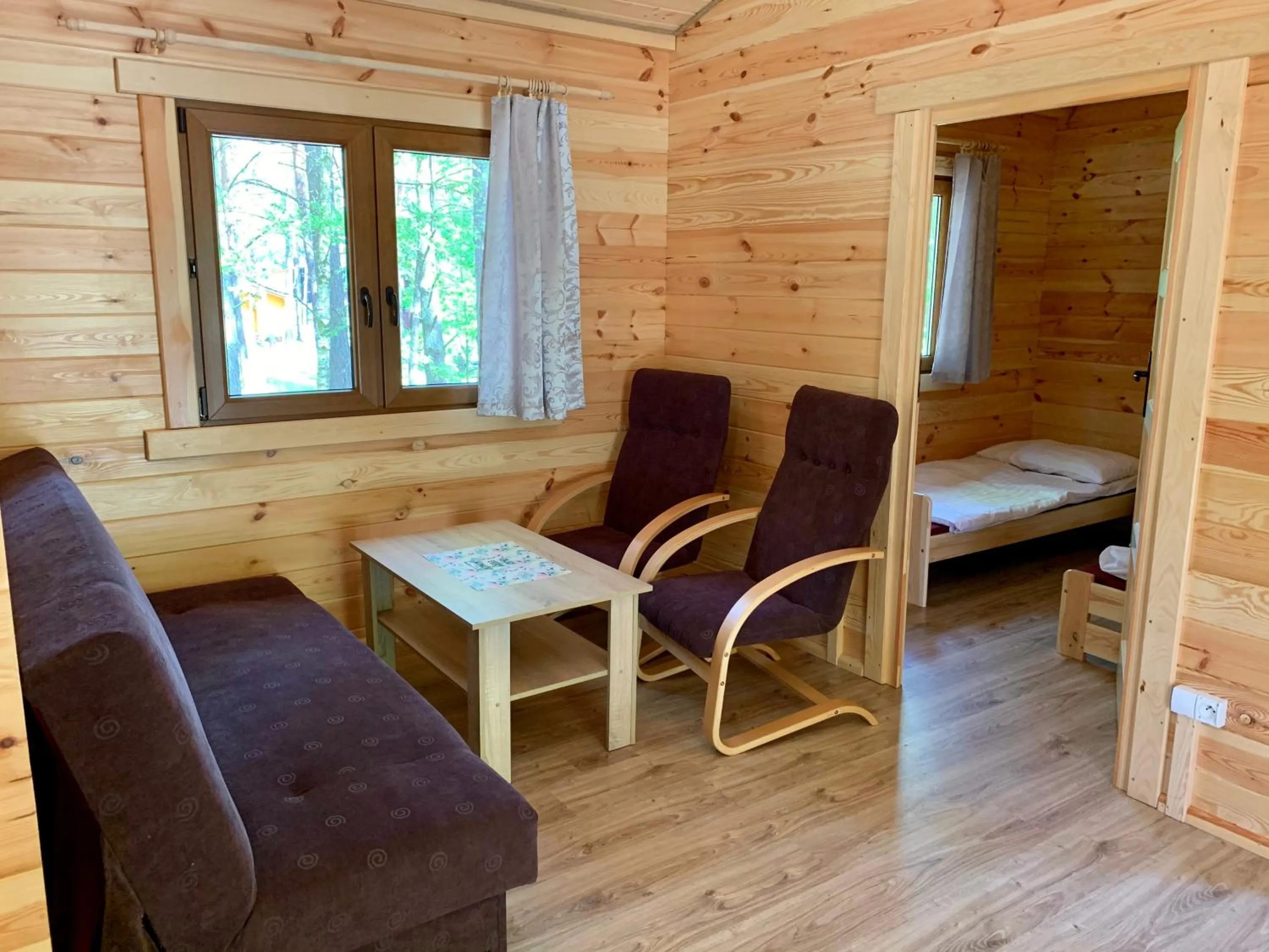 Living room, Bed in Ośrodek Wypoczynkowy Jeziornik