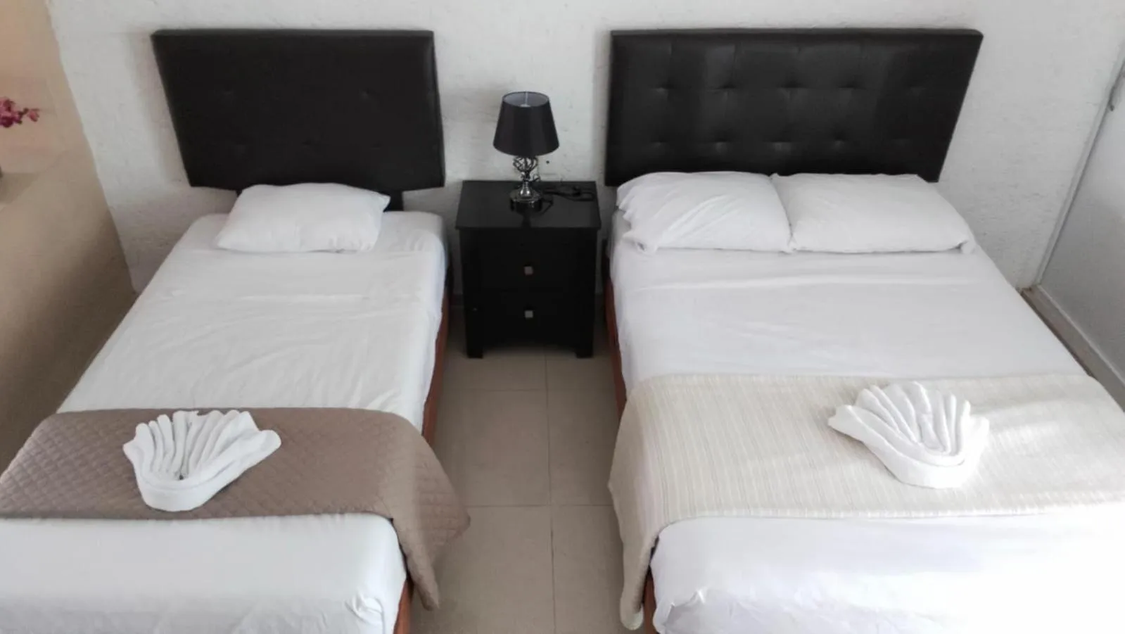 Bed in Hotel Dos Mundos, Isla Cozumel