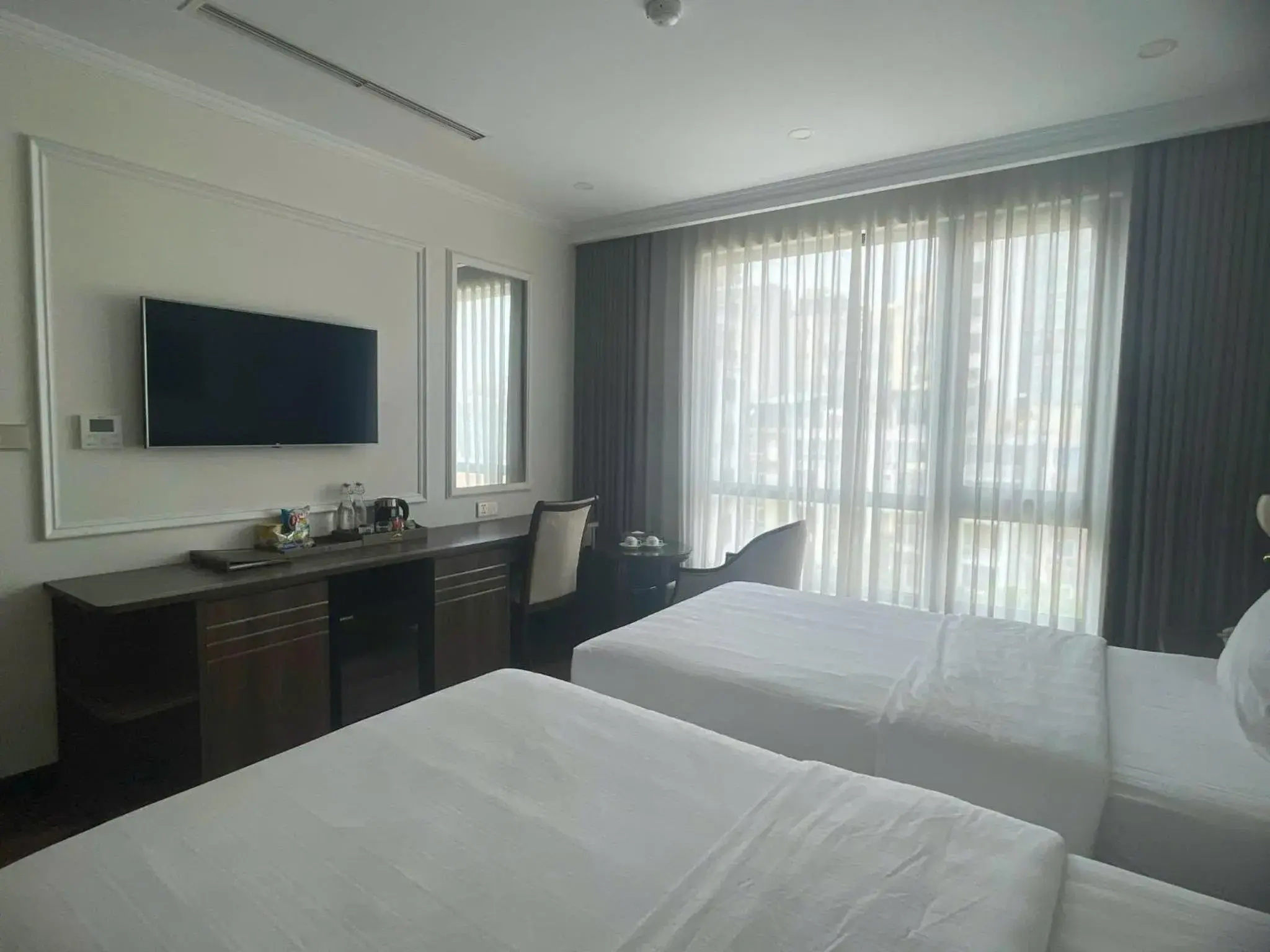 Photo of the whole room, Bed in Hillary Hanoi Hotel Photo of the whole room, Bed in Hillary Hanoi Hotel