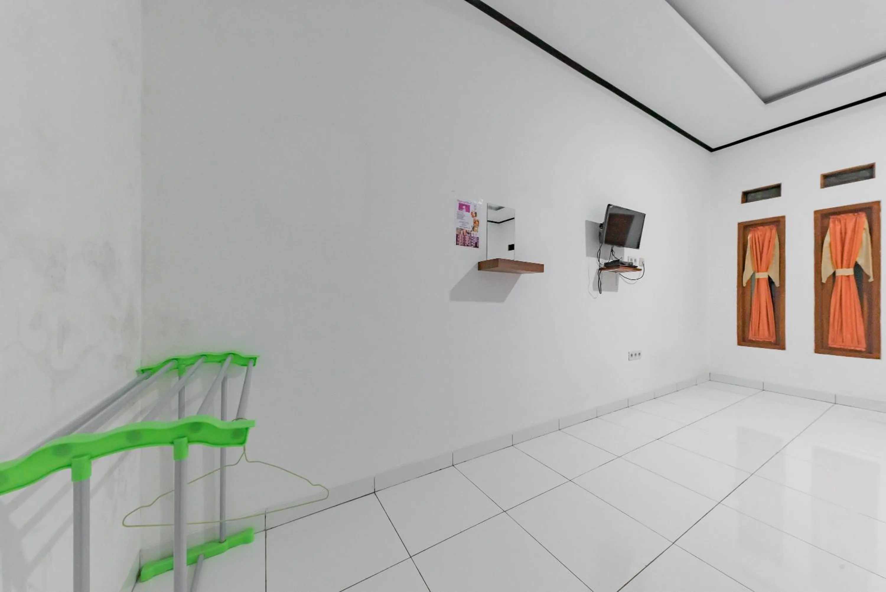 TV and multimedia in RedDoorz @ Geopark Ciletuh Sukabumi