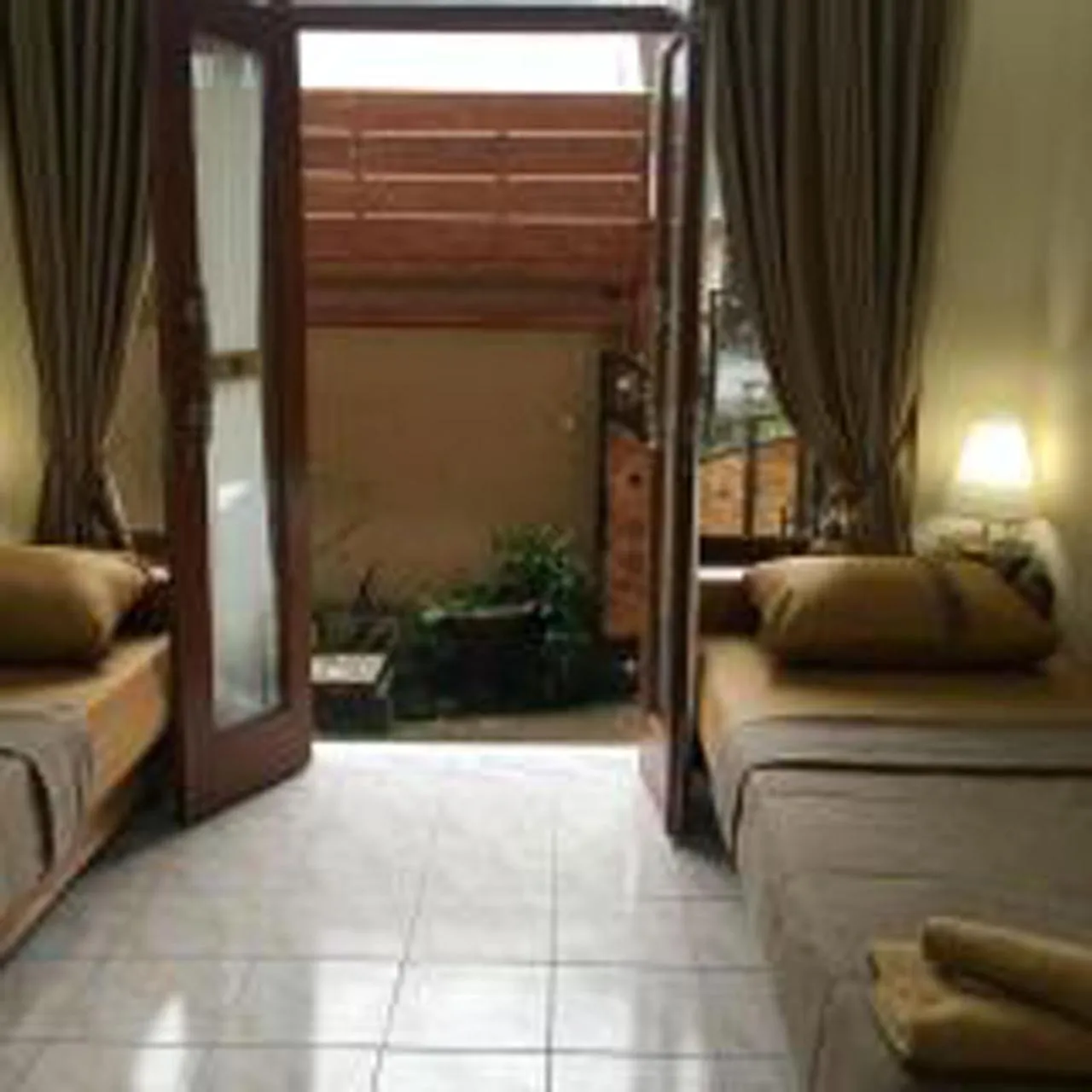 Bed in Bulan Bali Guest House