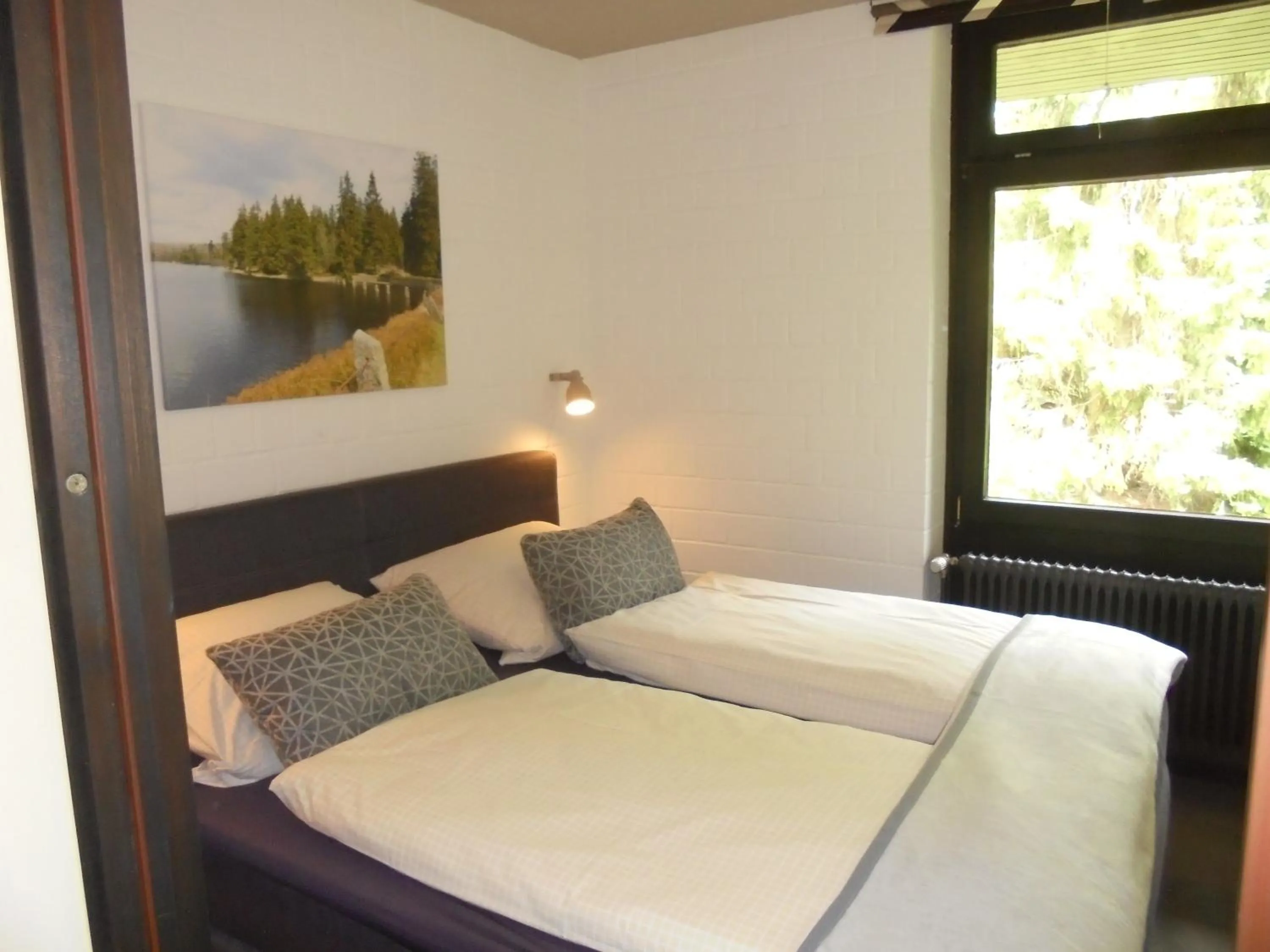 Bed in Mein Vierjahreszeiten Hotel Garni Superior