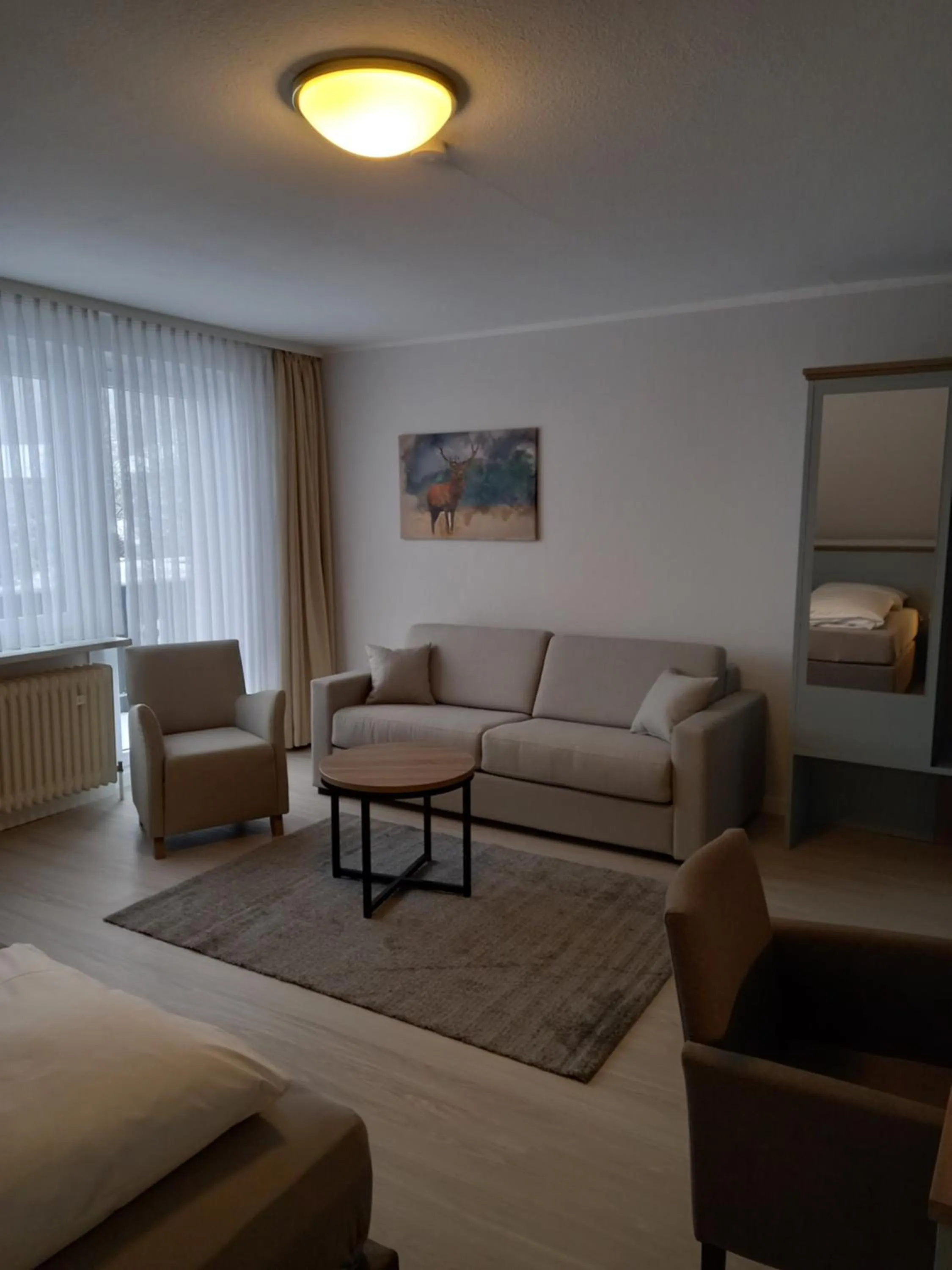 Living room, Bed in Mein Vierjahreszeiten Hotel Garni Superior