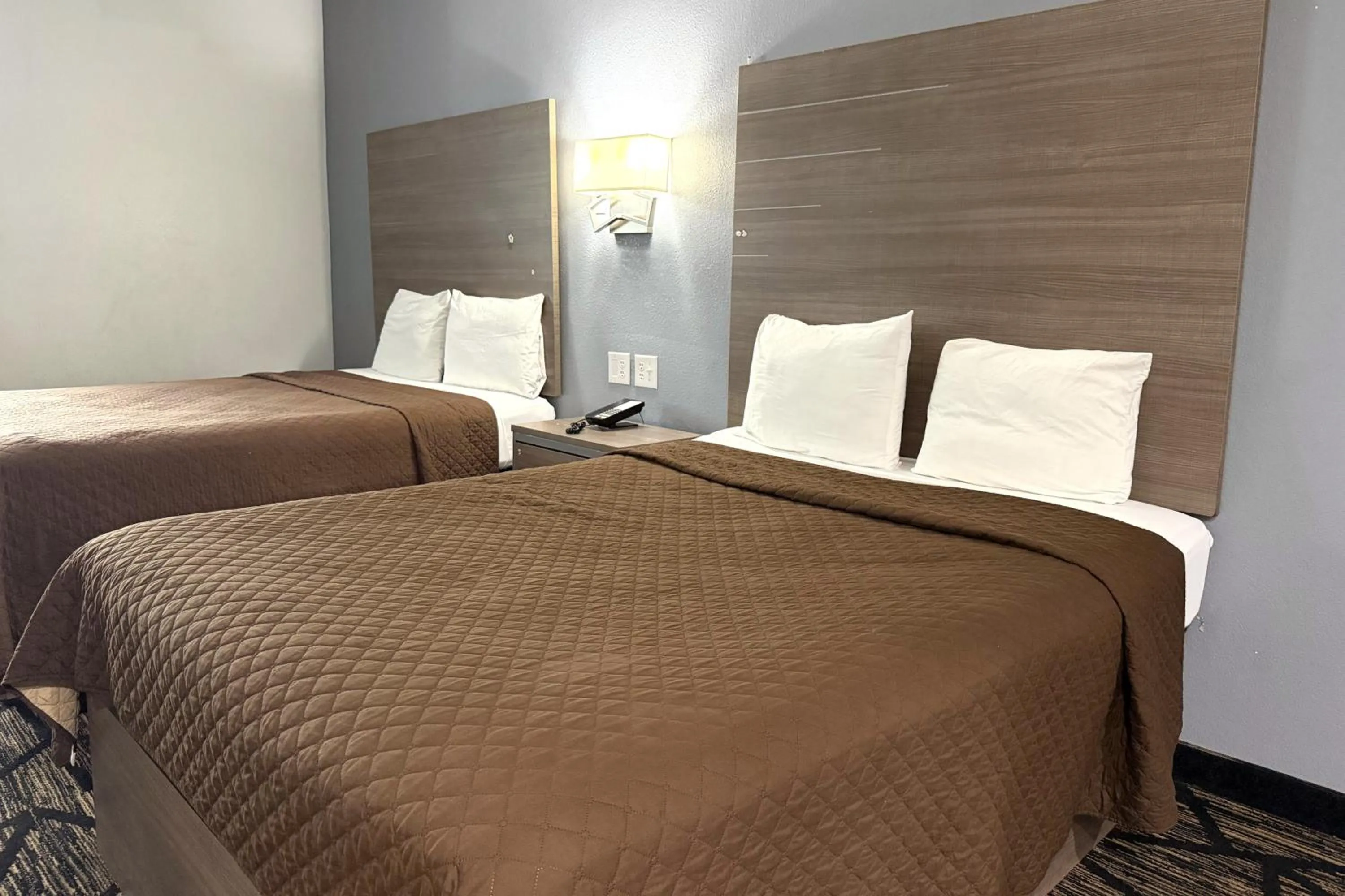 Bedroom, Bed in Hotel Royale IAH Airport North Houston I-45