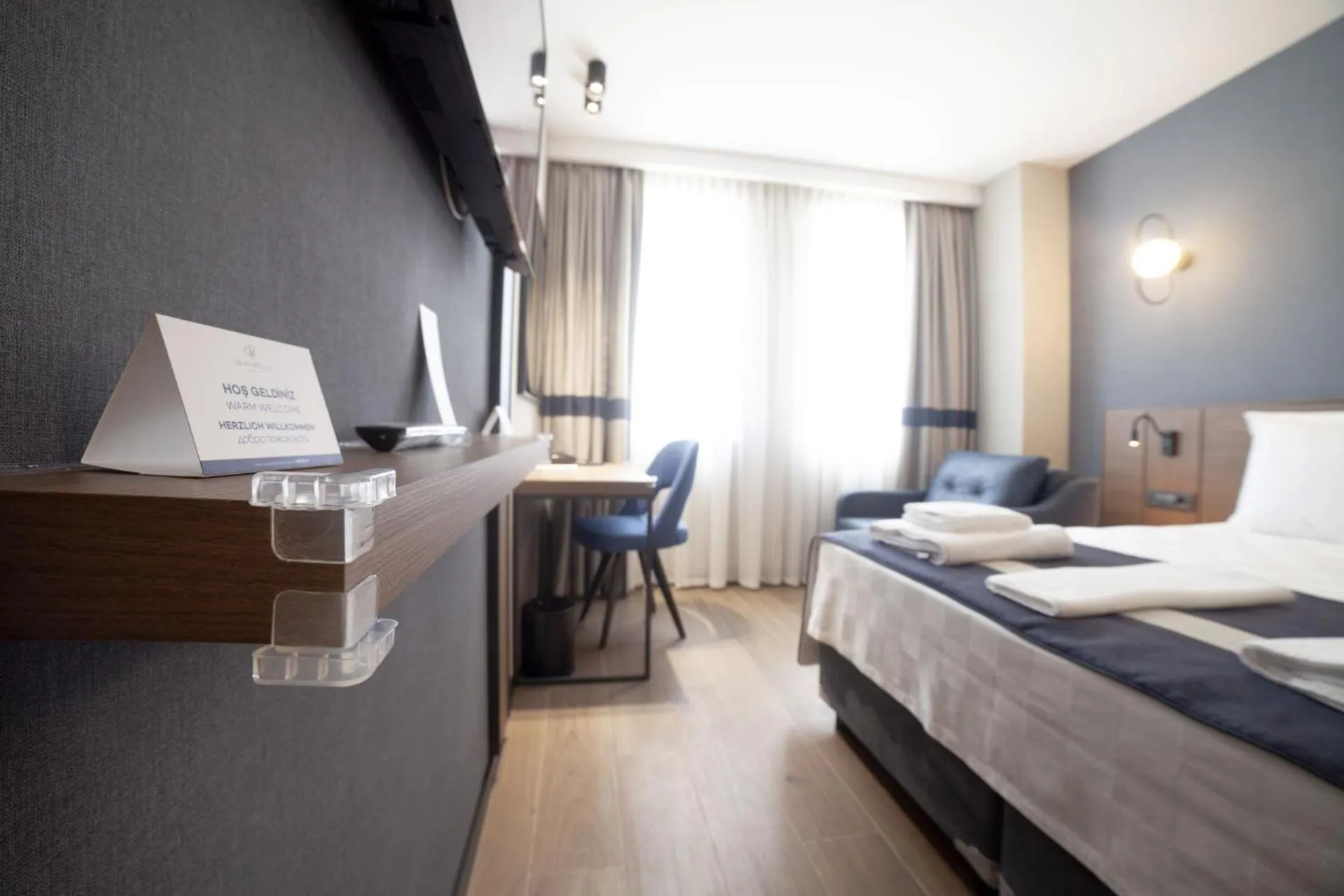 Bed in GRANBELLAHOTEL