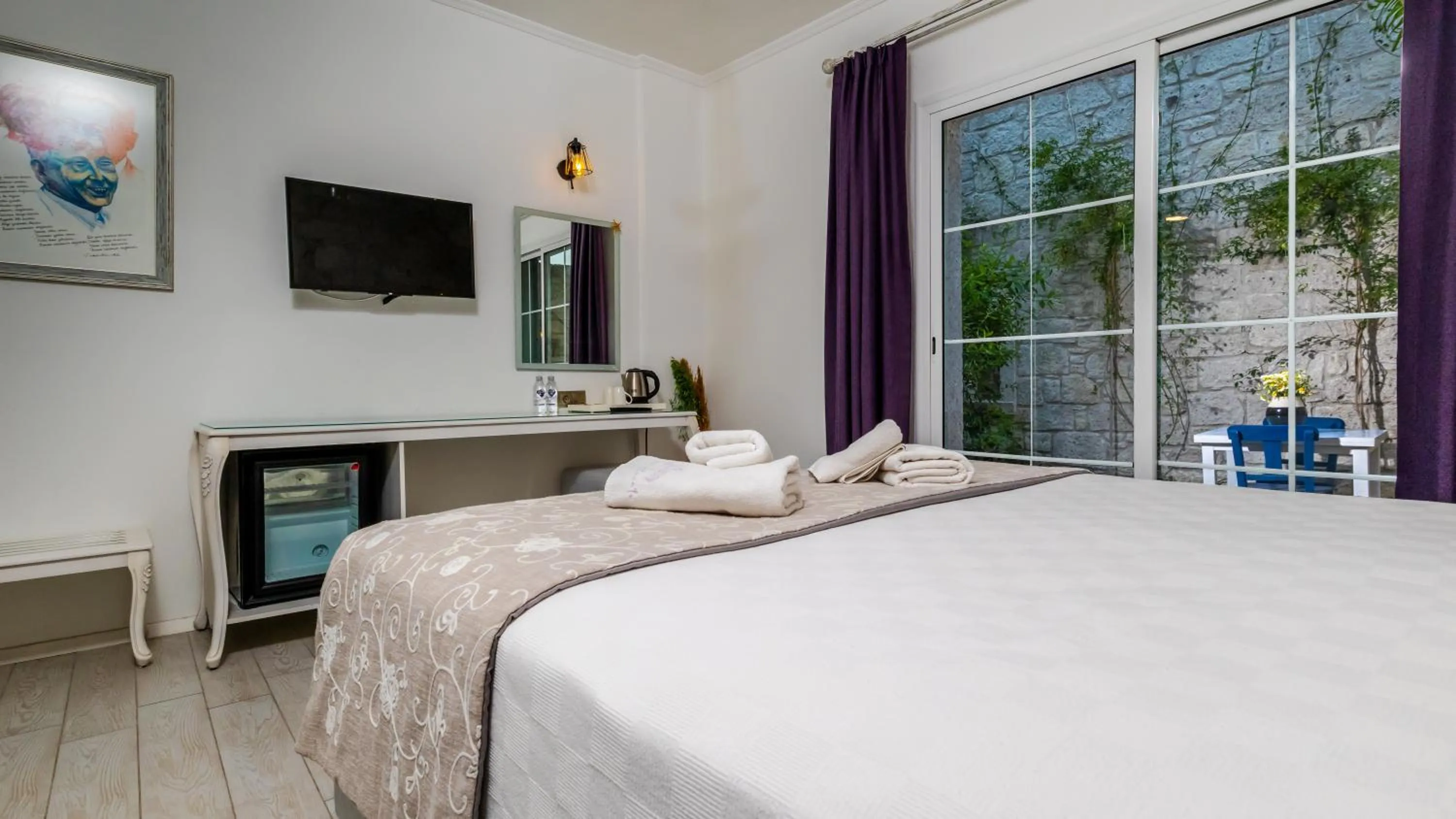 Bed in Avlu Alaçatı Boutique Hotel