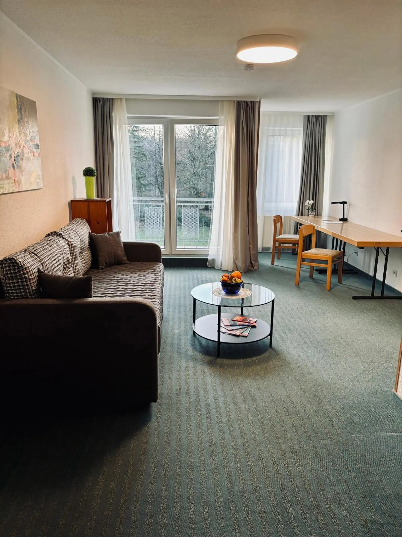 Living room, Bed in Hotel Bessunger Forst