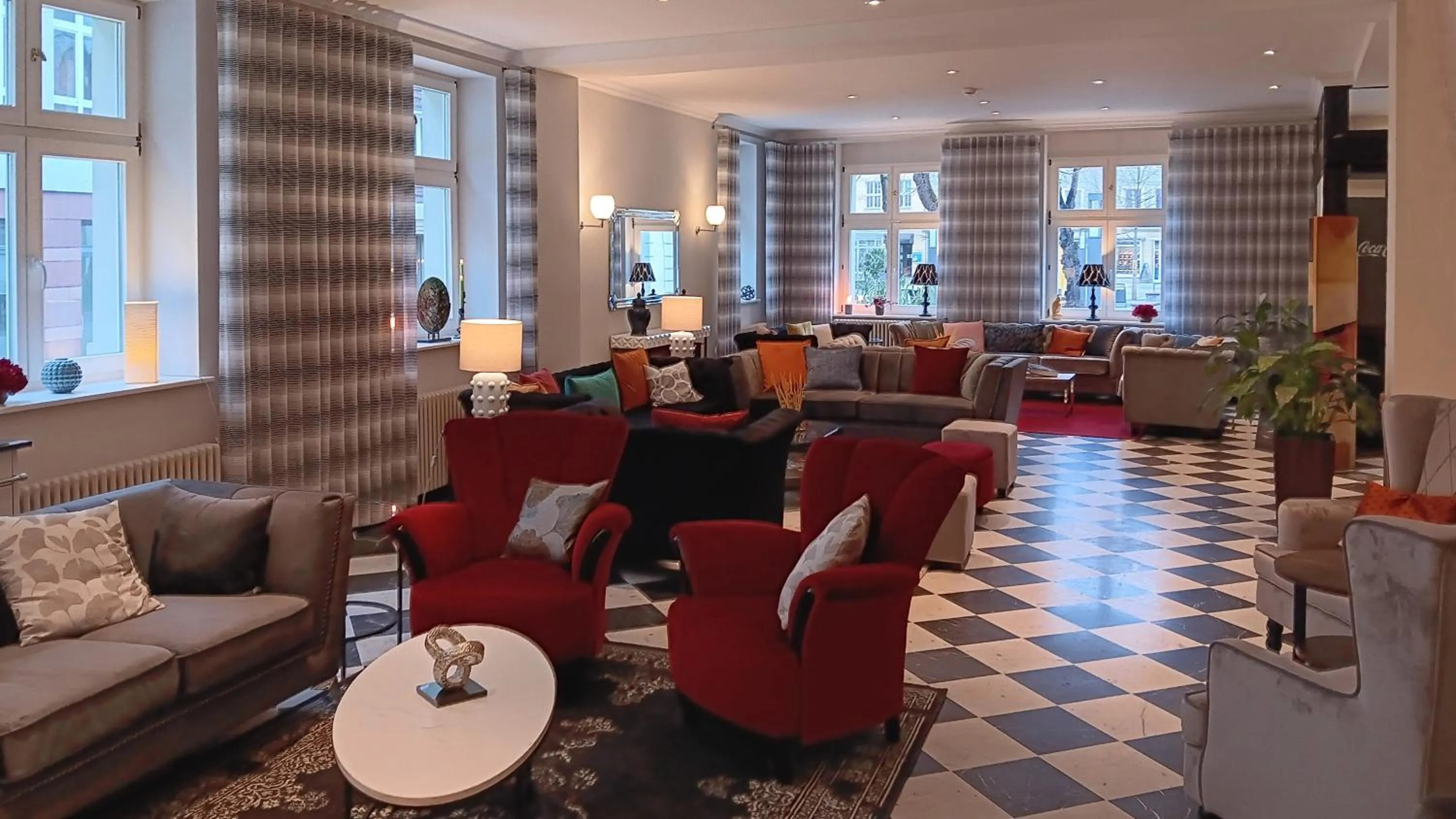 Lobby or reception in SORAT Hotel Cottbus