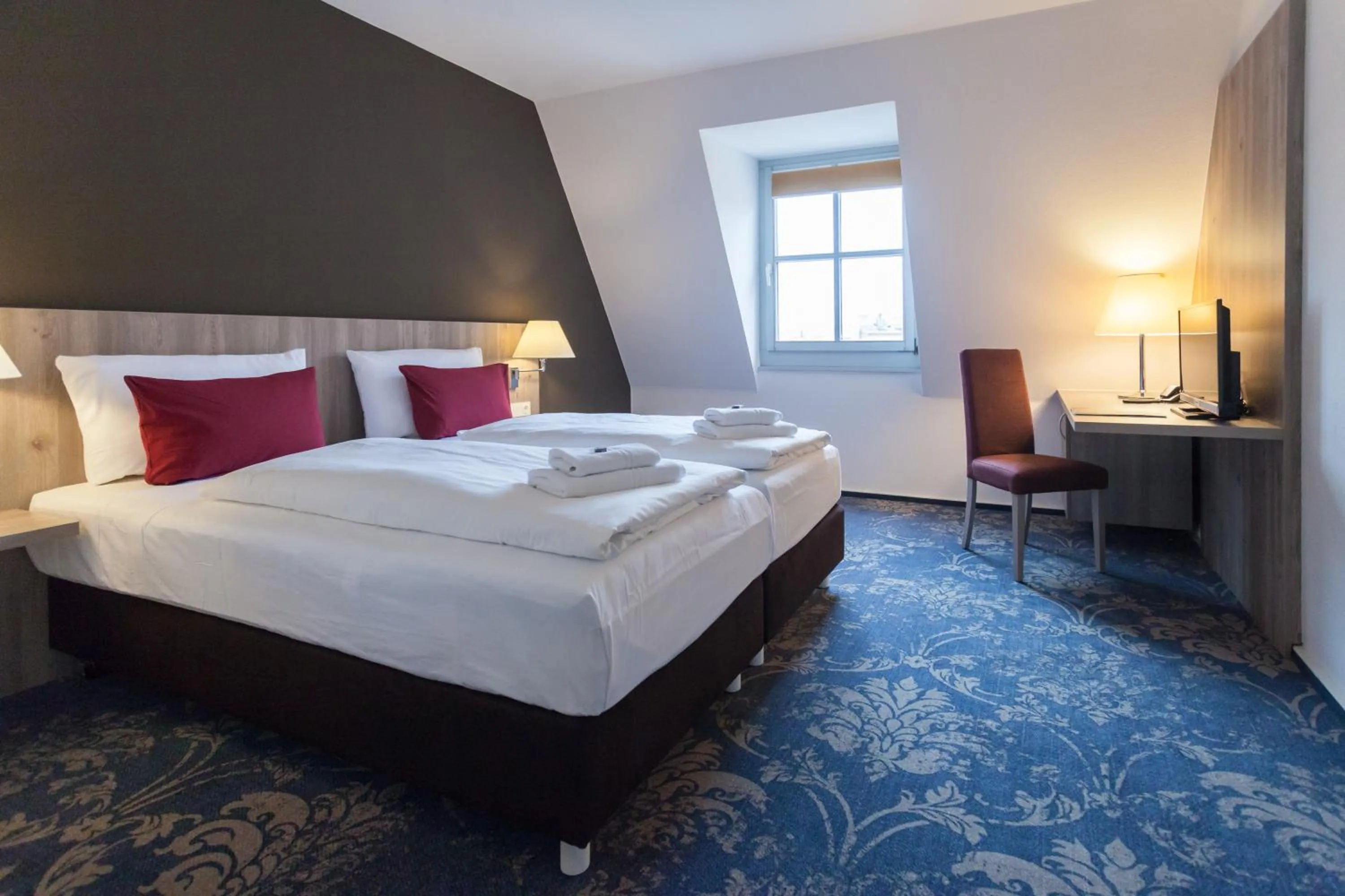 Photo of the whole room, Bed in martas Hotel Lutherstadt Wittenberg