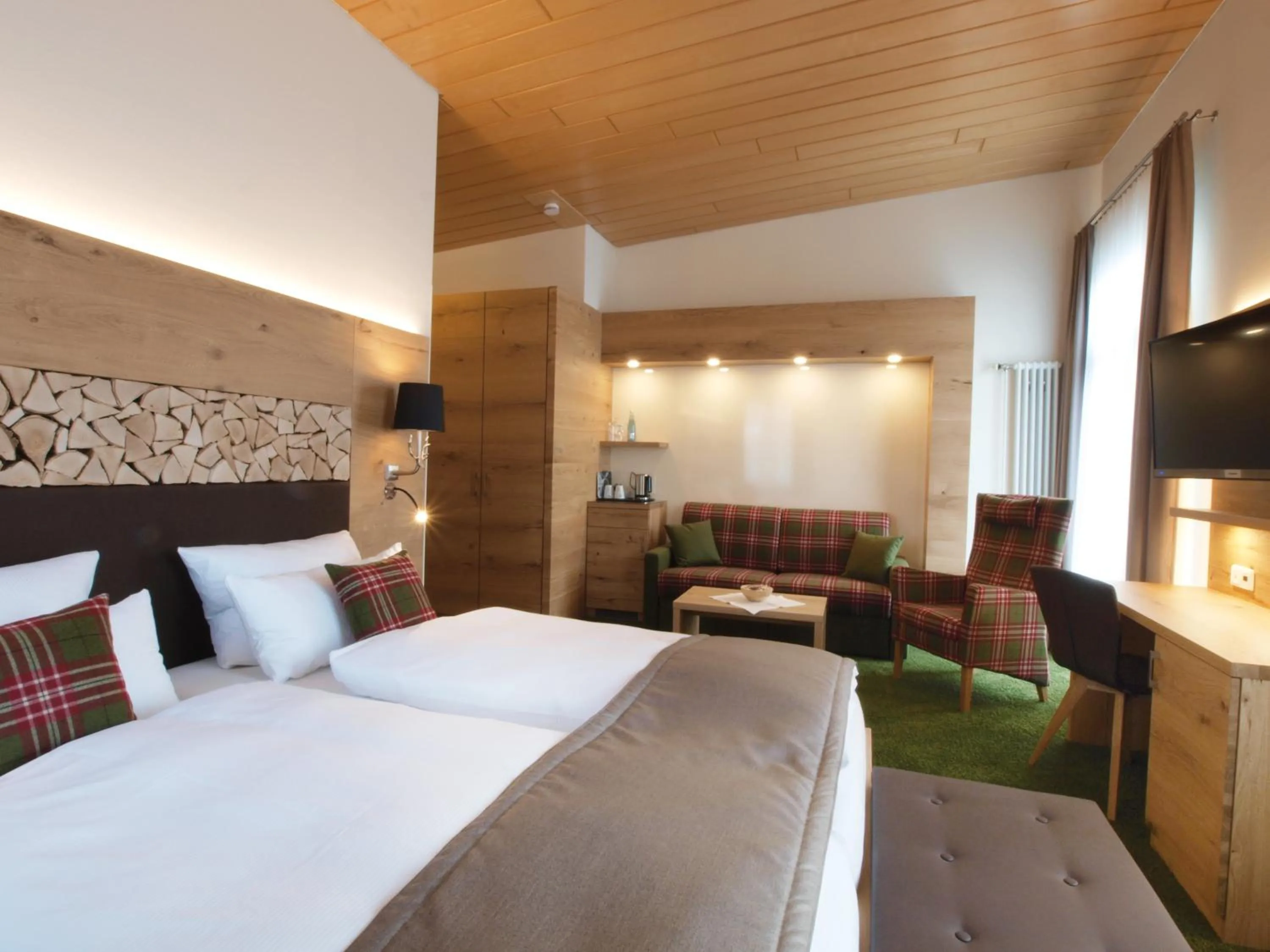 Photo of the whole room, Bed in Das Waldhotel - Genuss & Wellness am Notschreipass