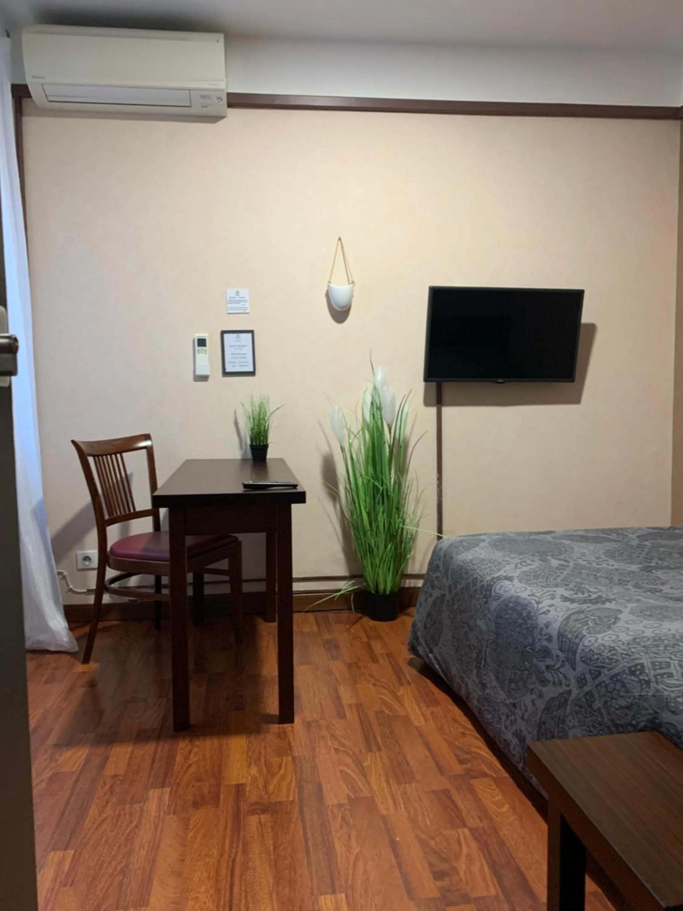 Bed in L'EMBLEME - BOUTIQUE HOTEL