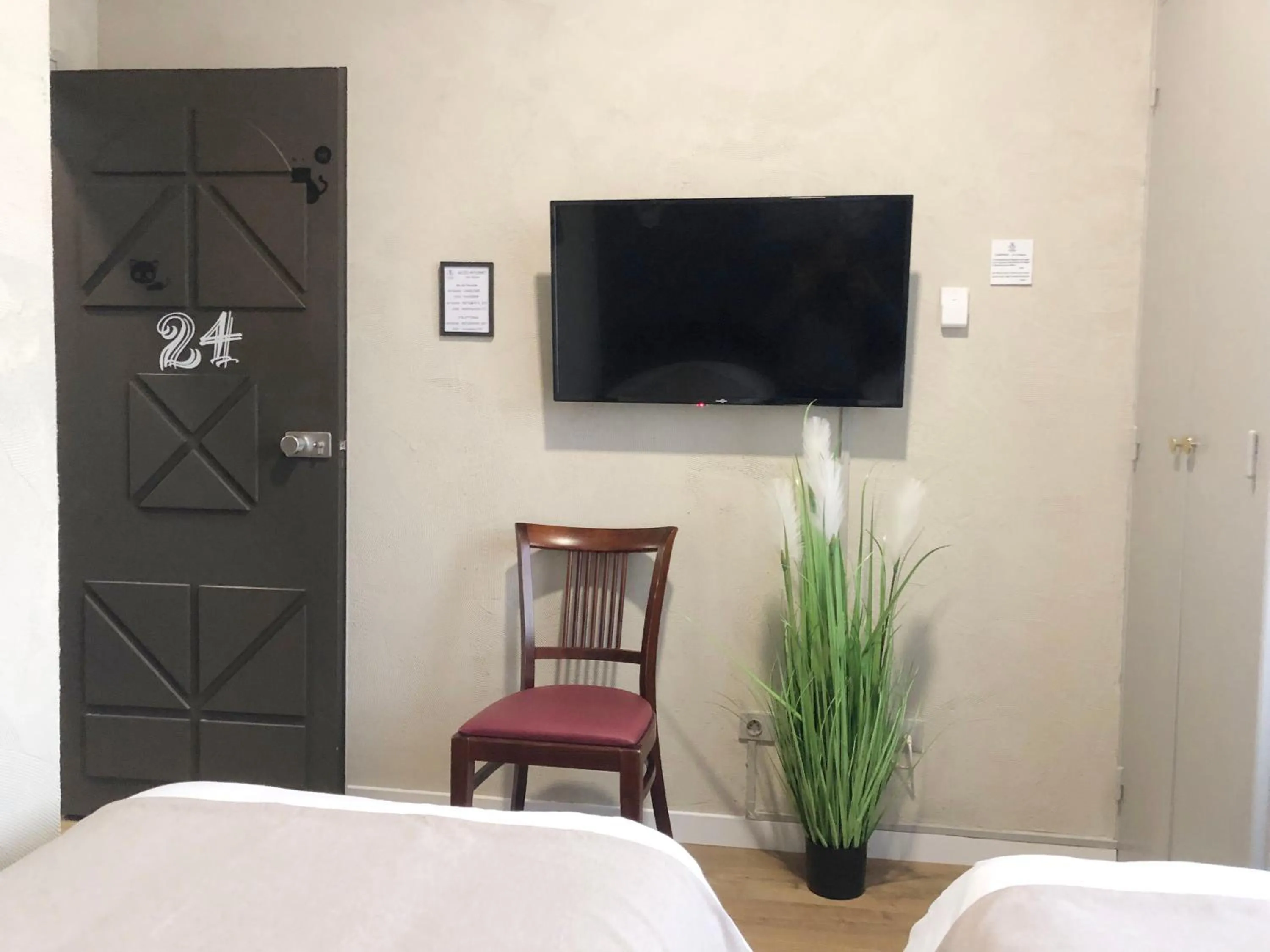 Bed in L'EMBLEME - BOUTIQUE HOTEL