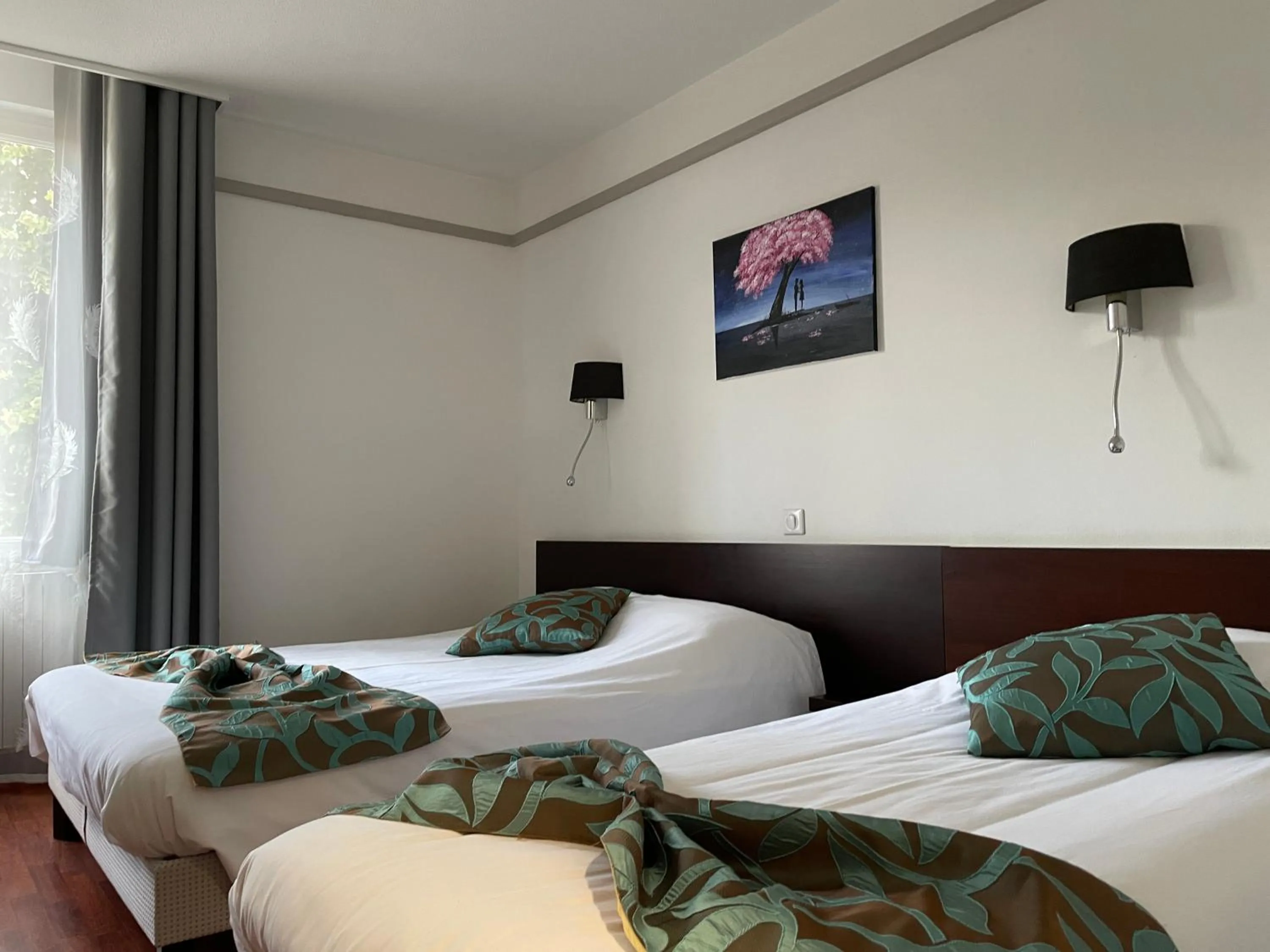 Bed in L'EMBLEME - BOUTIQUE HOTEL