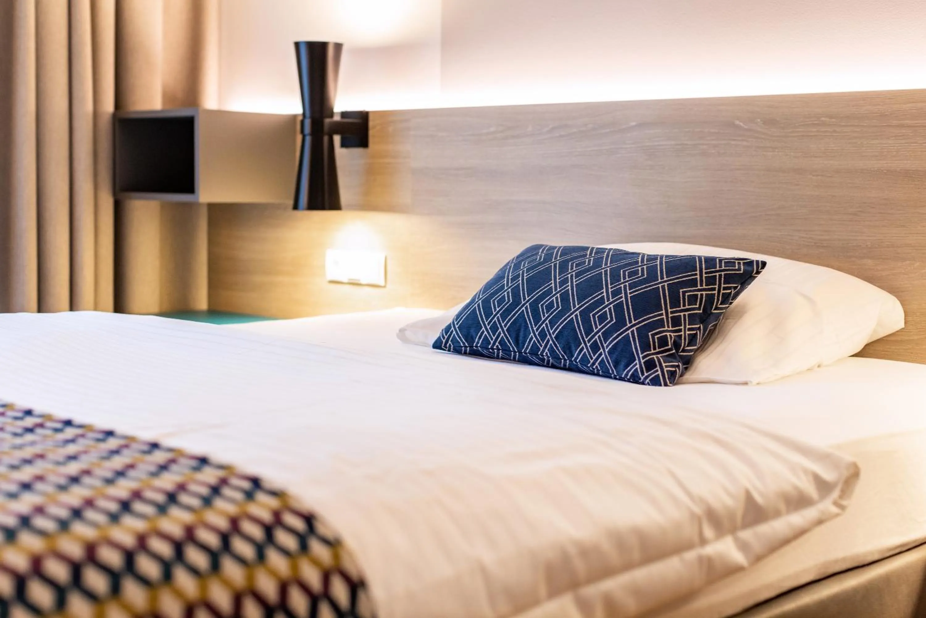 Bed in Parkhotel Maximilian Ottobeuren